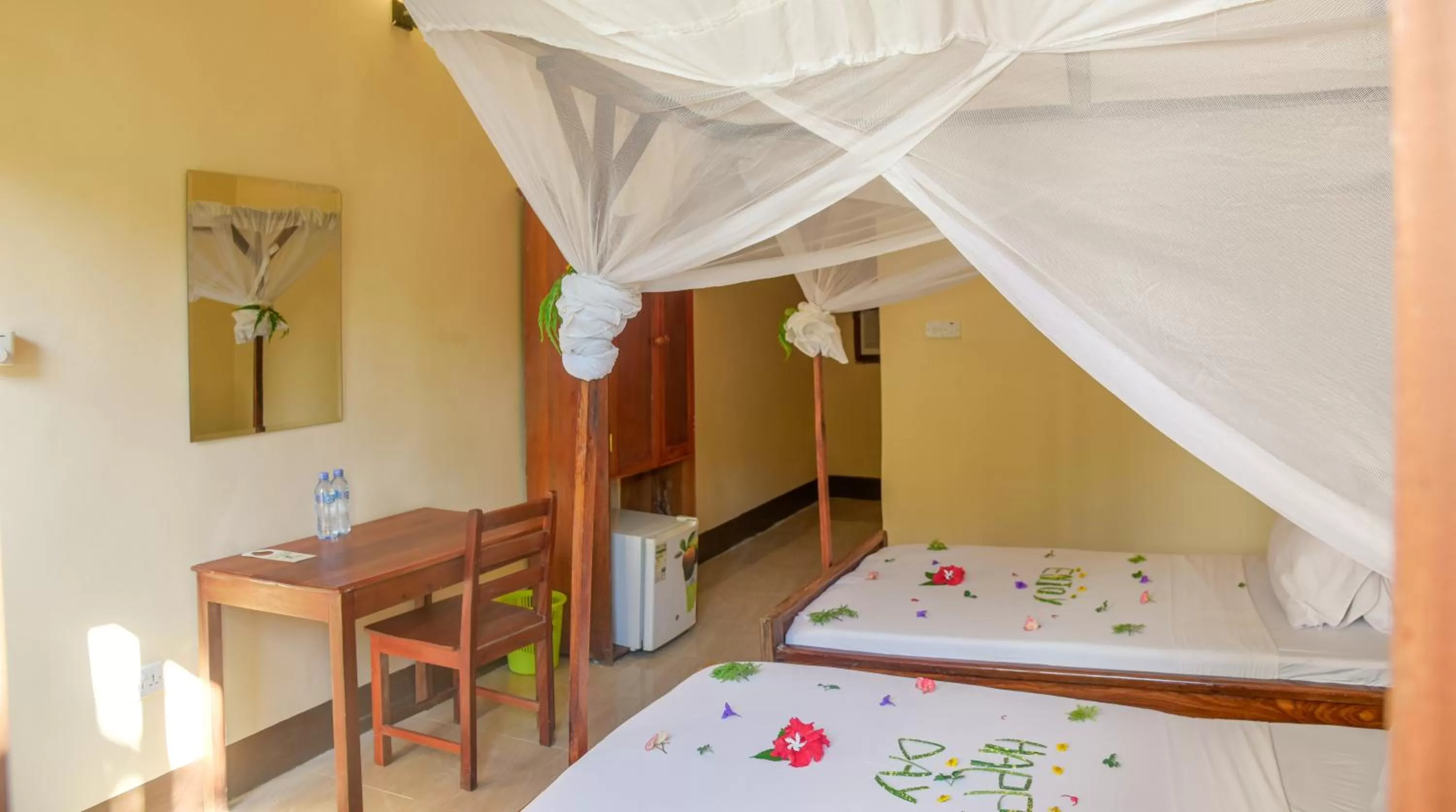 Bed in Amaan Beach Bungalows