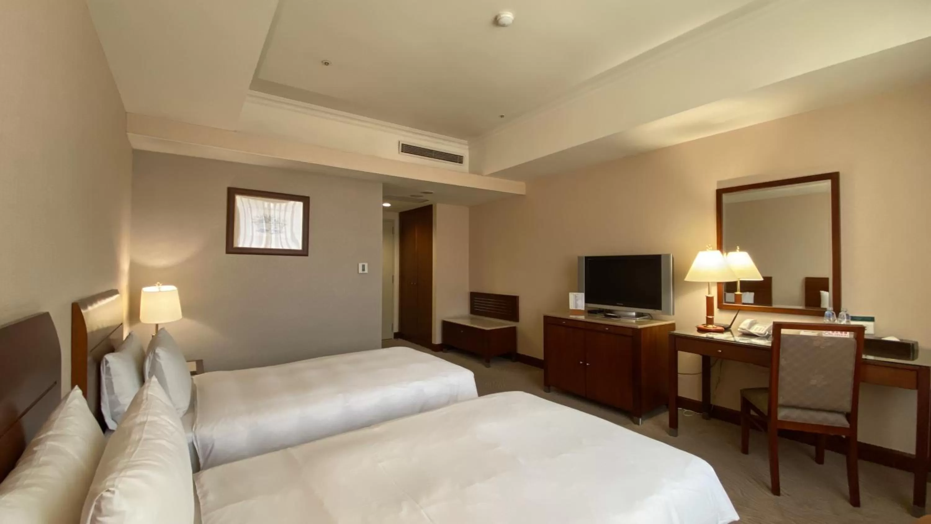 Photo of the whole room, Bed in Monarch Plaza Hotel