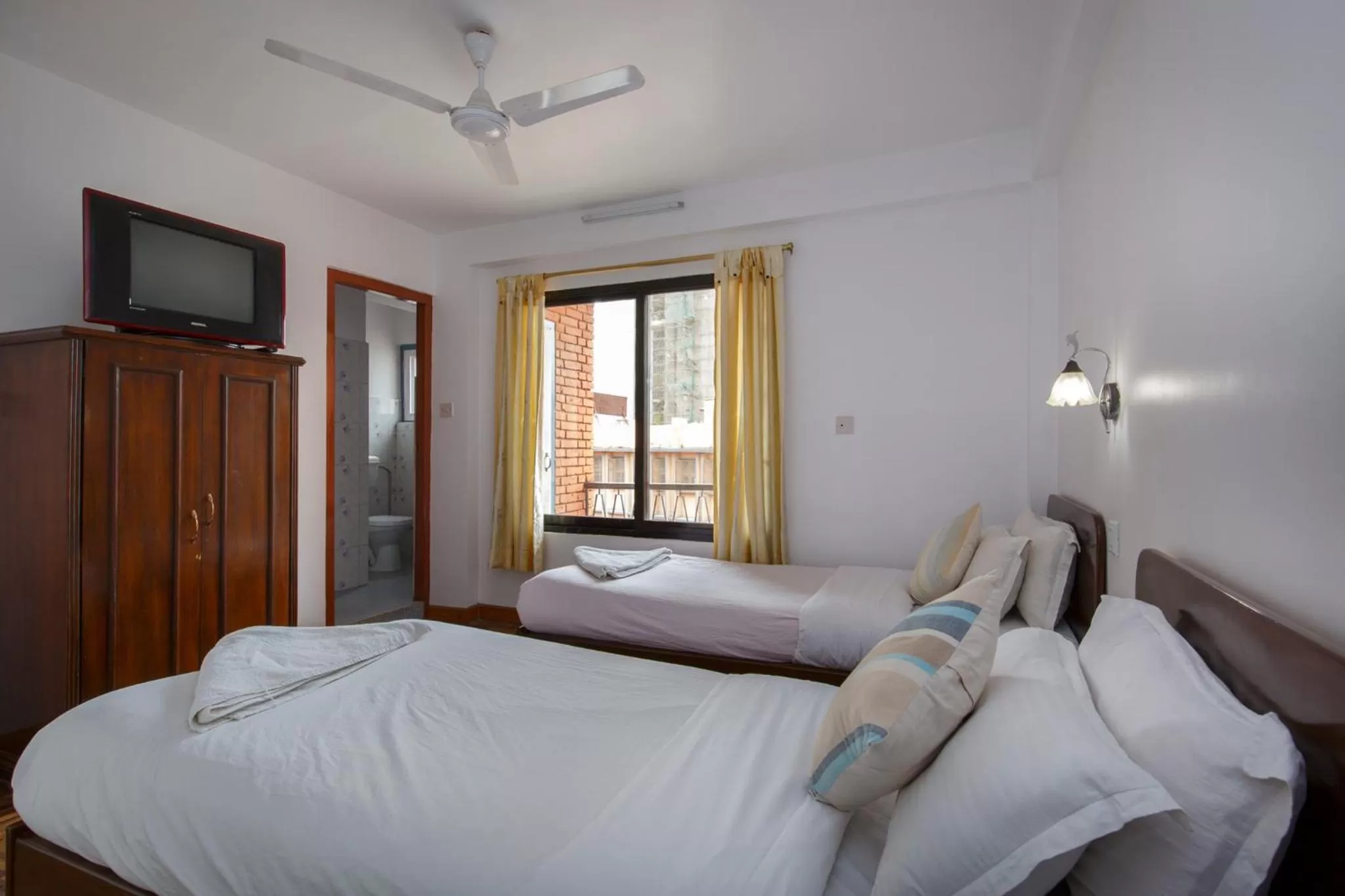 Bed in Pacific Guest House