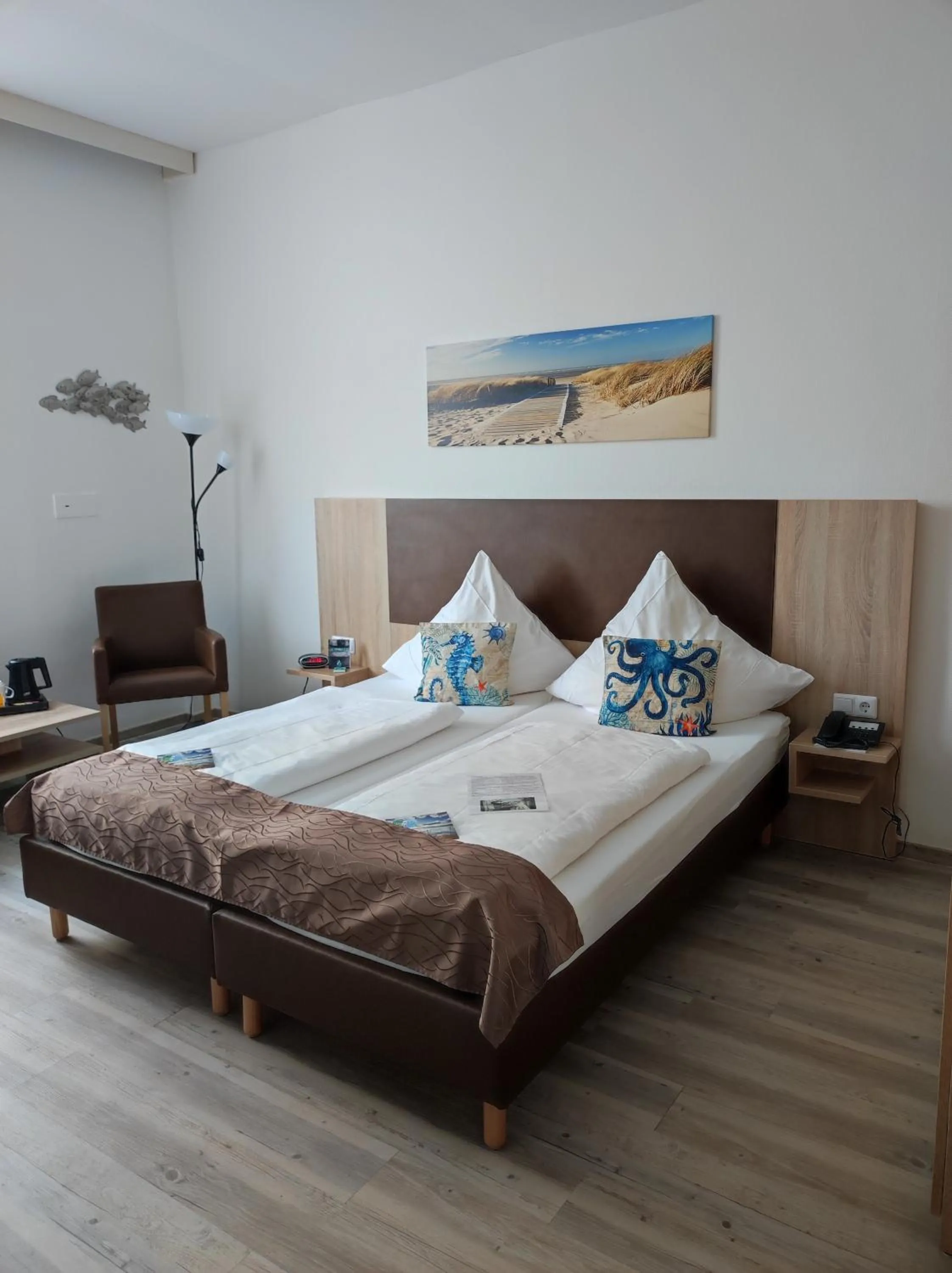 Photo of the whole room, Bed in Nordsee Hotel Borkum