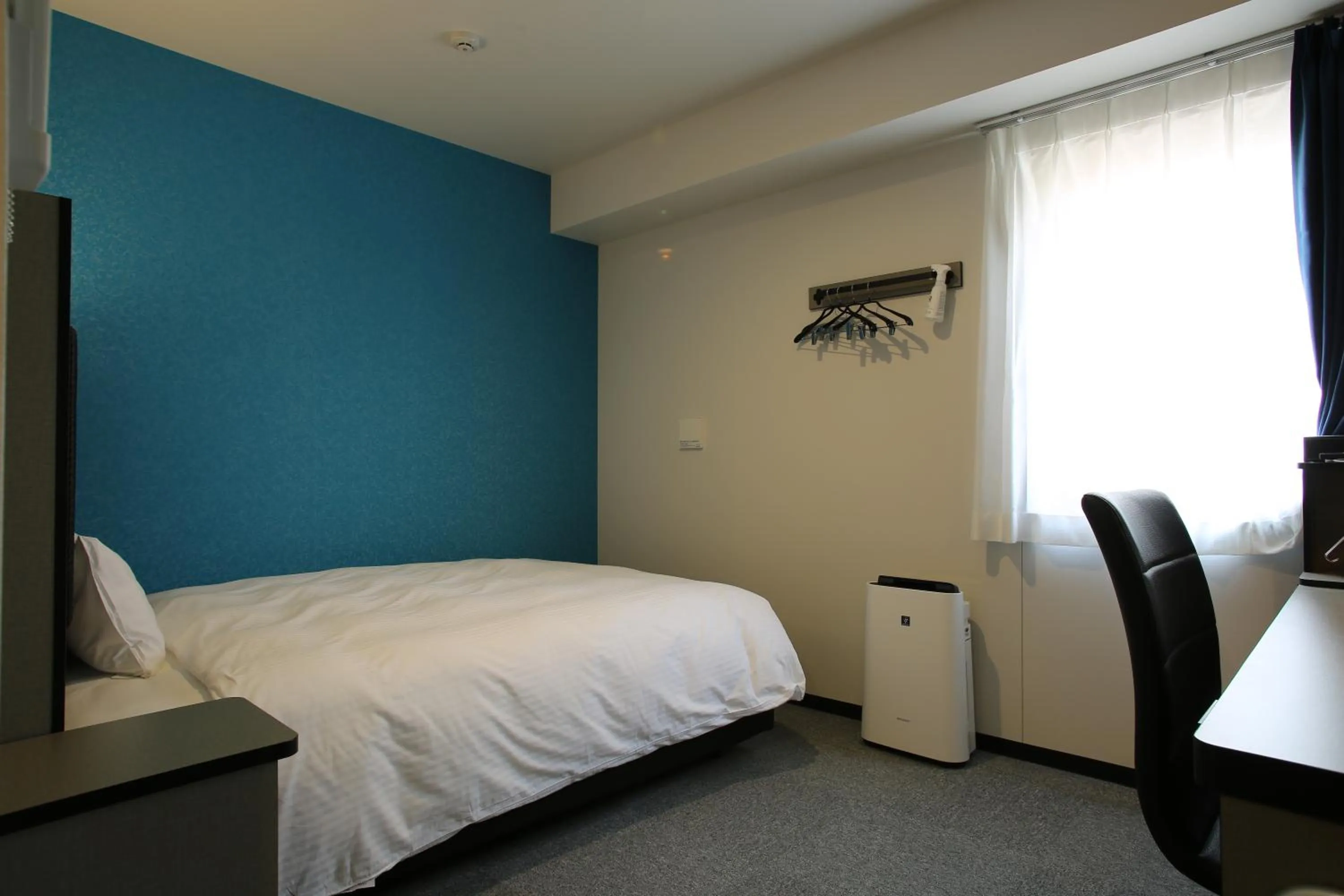 Photo of the whole room, Bed in Green Rich Hotel & Capsule Naha - Artificial hot spring Futamata Yunohana