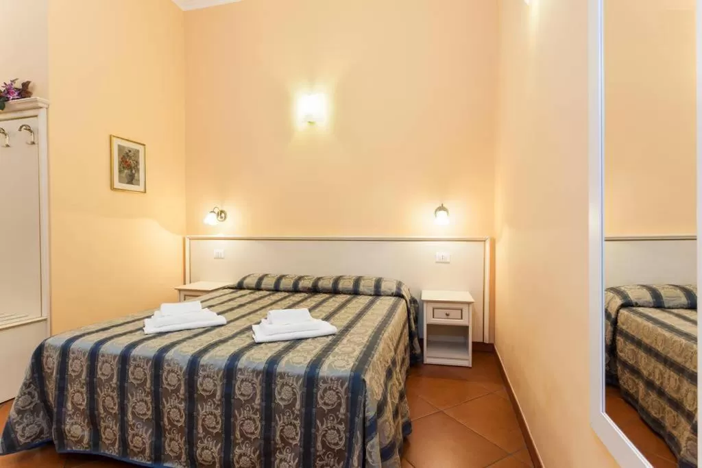 Photo of the whole room, Bed in Vatican Town