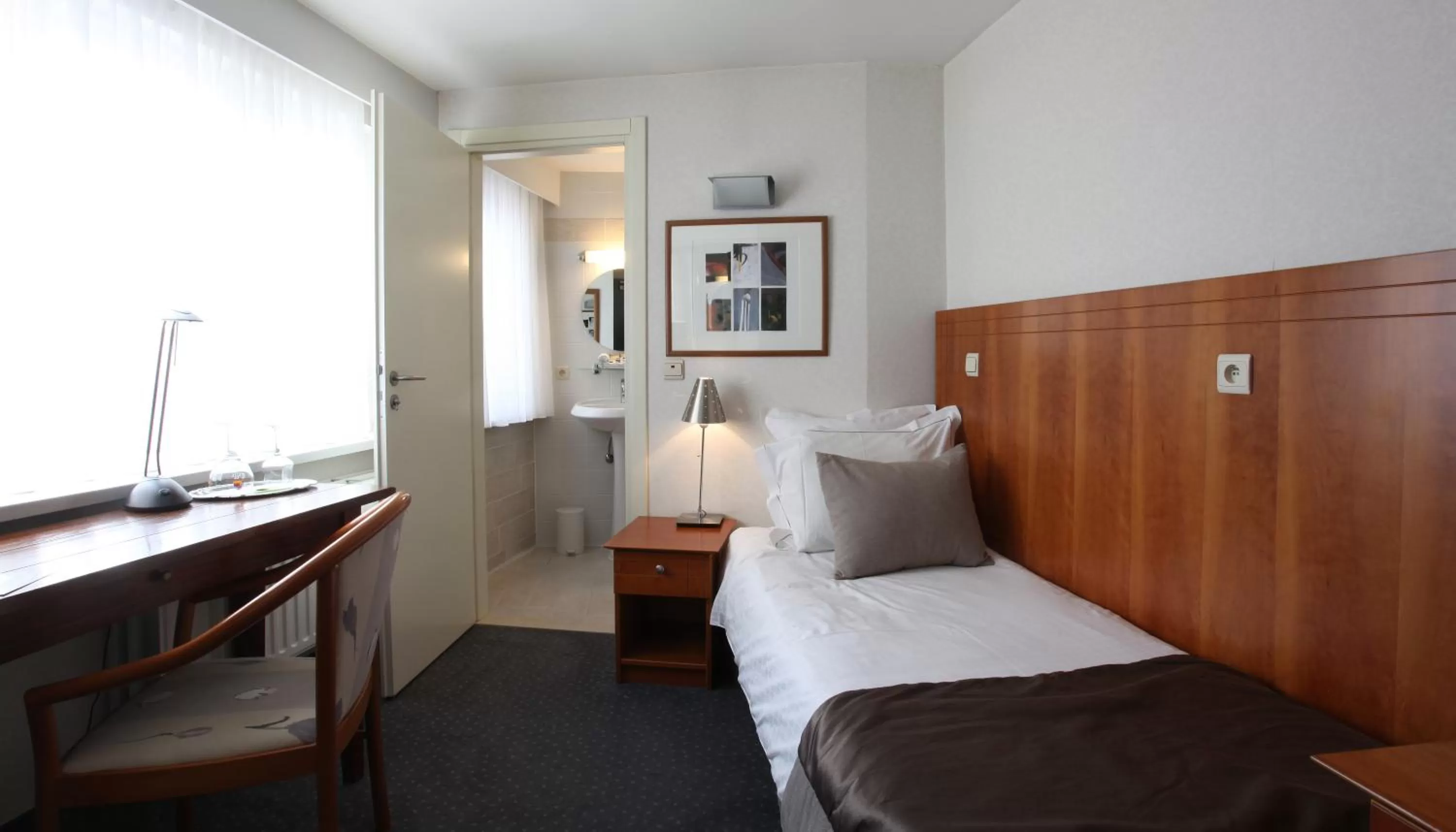 Bed in Theater Hotel Leuven Centrum