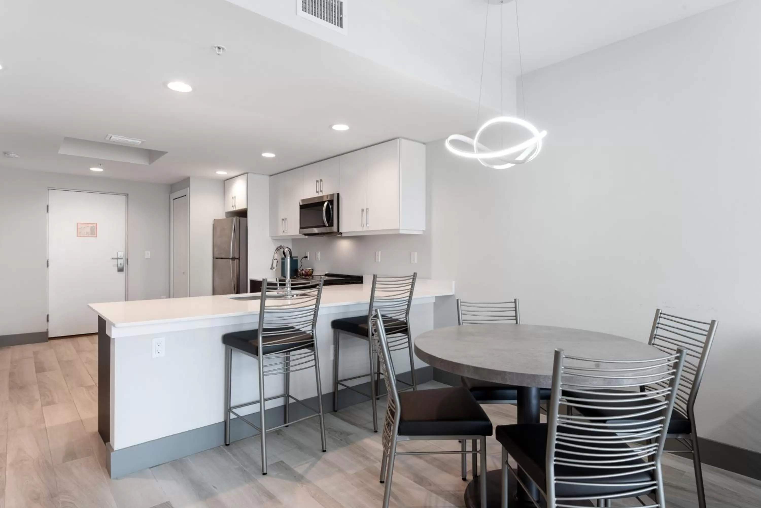 Kitchen or kitchenette in FUSION Resort Waterfront Suites