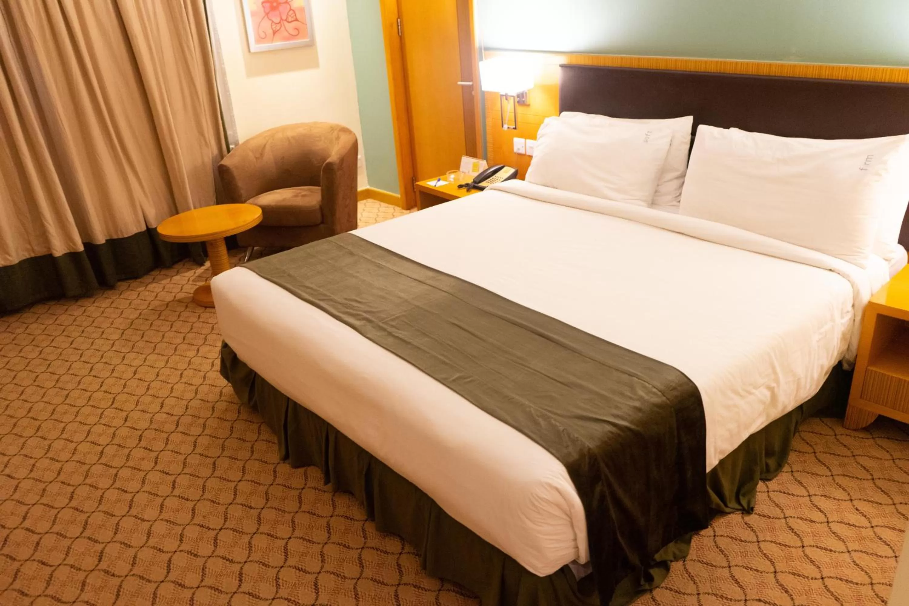 Photo of the whole room, Bed in Holiday Inn Dar Es Salaam by IHG