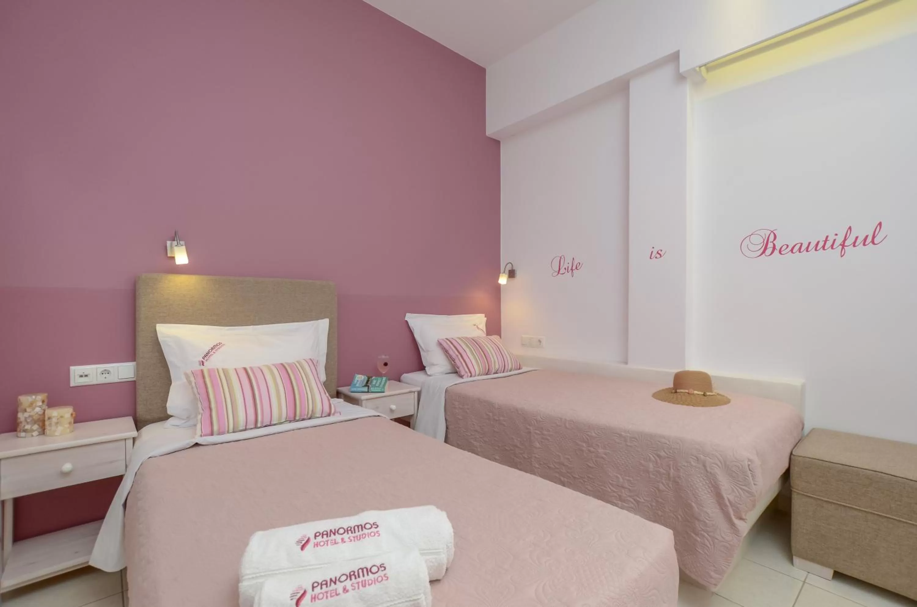 Bed in Panormos Hotel and Studios