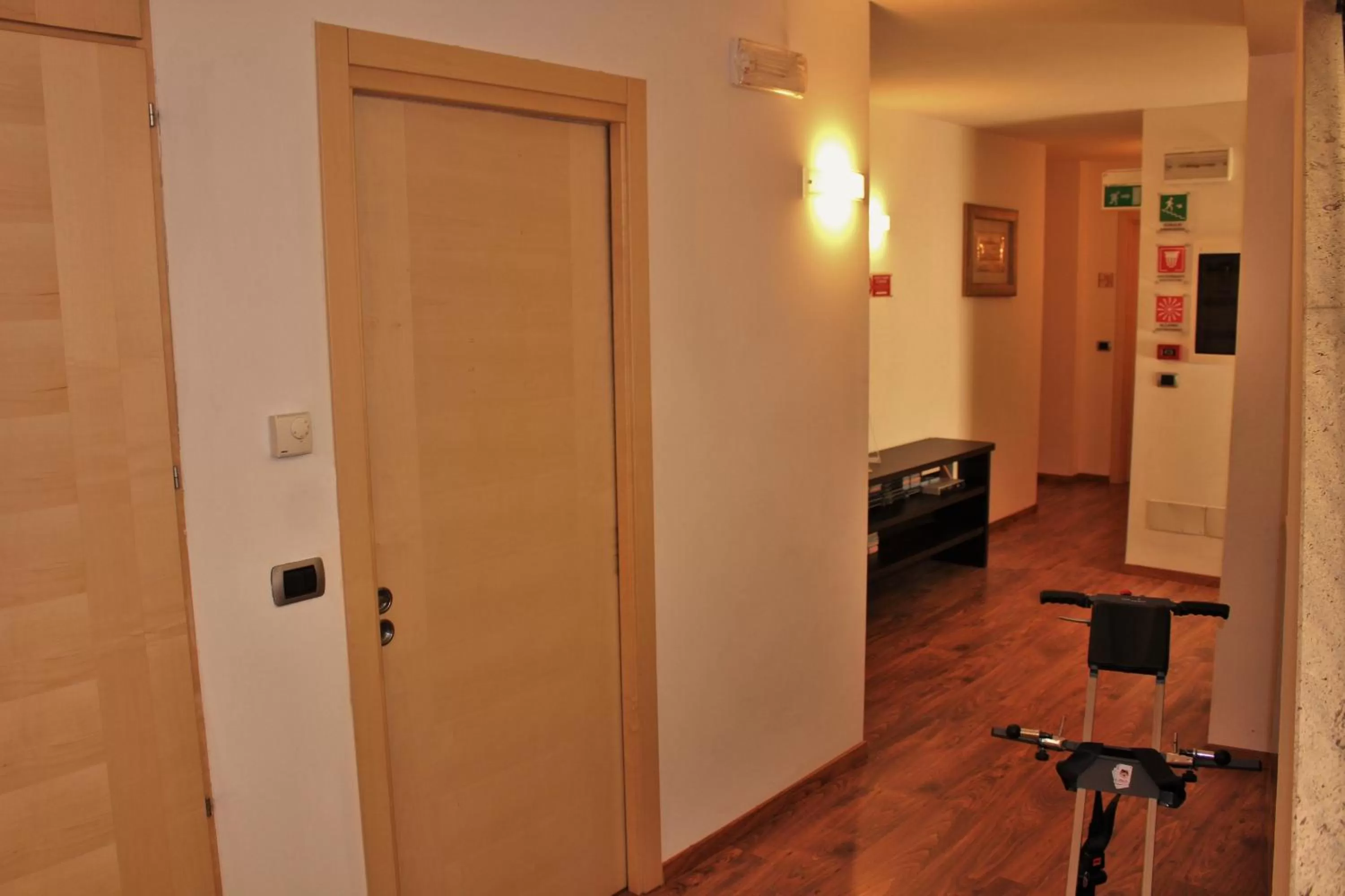 Bed in Al Fogolâr Rooms & Osteria with Saunaland