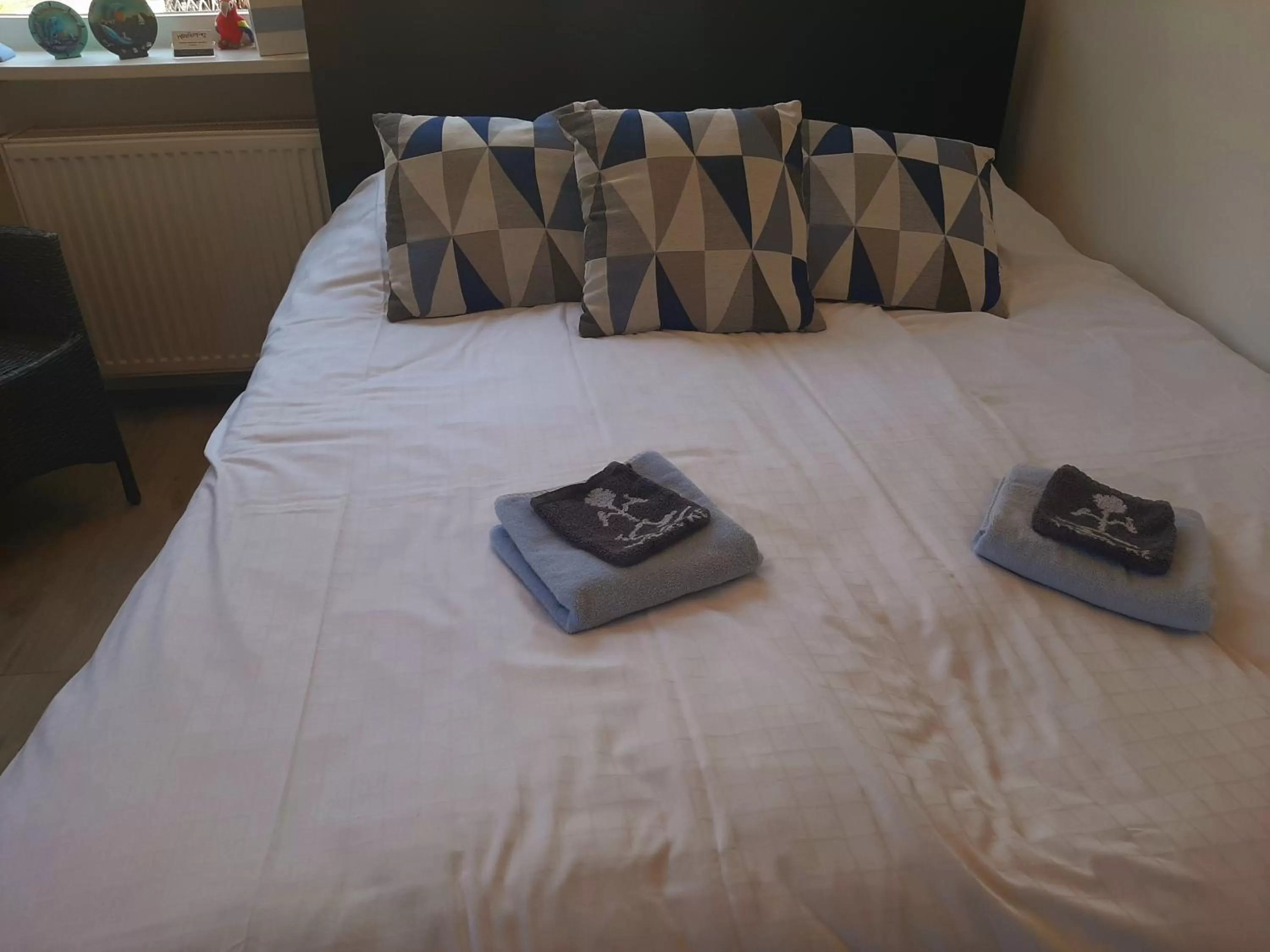 Bed in Tuinhuis Duinroos Deluxe