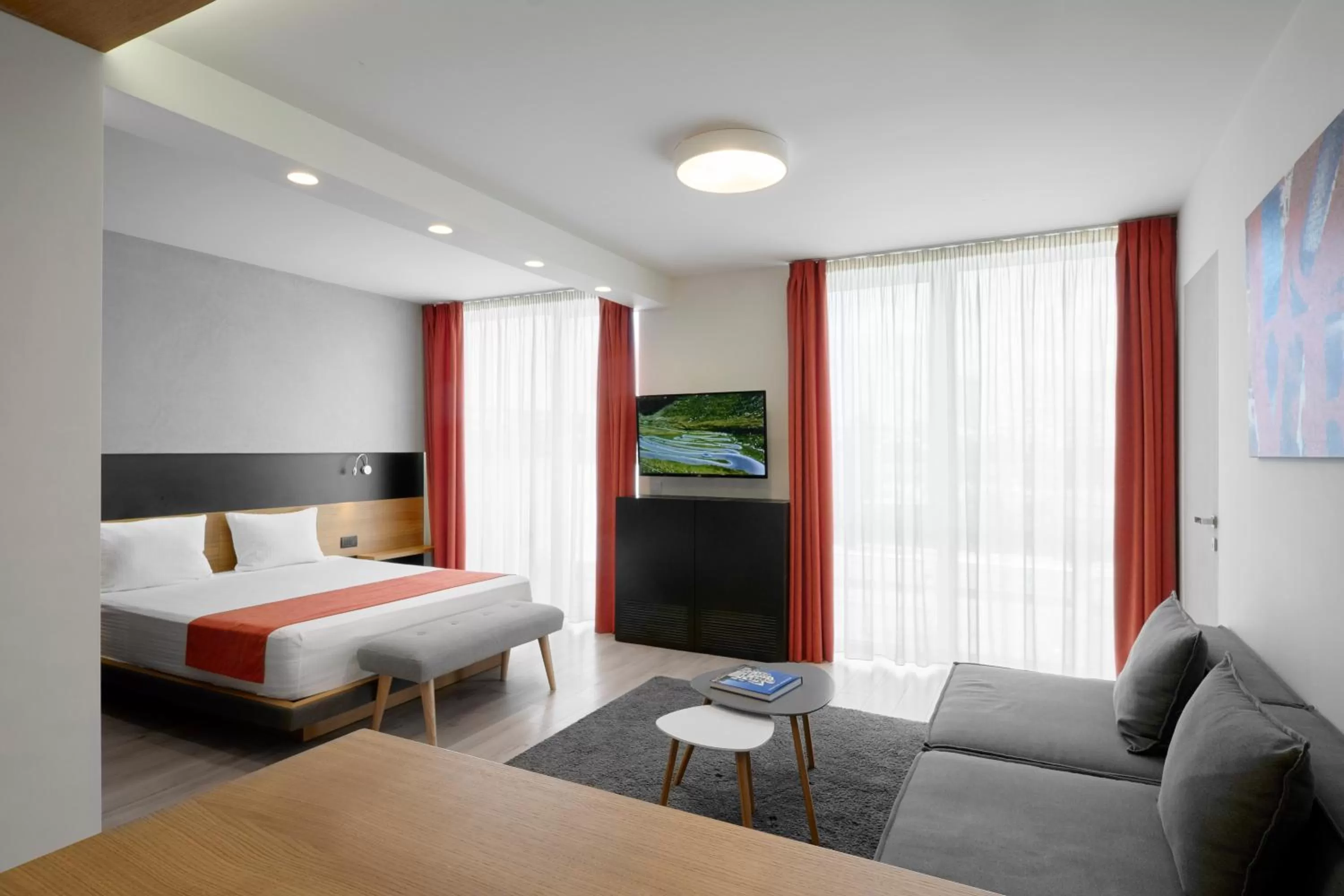 TV and multimedia in Adella Boutique Hotel - Free Secured Parking