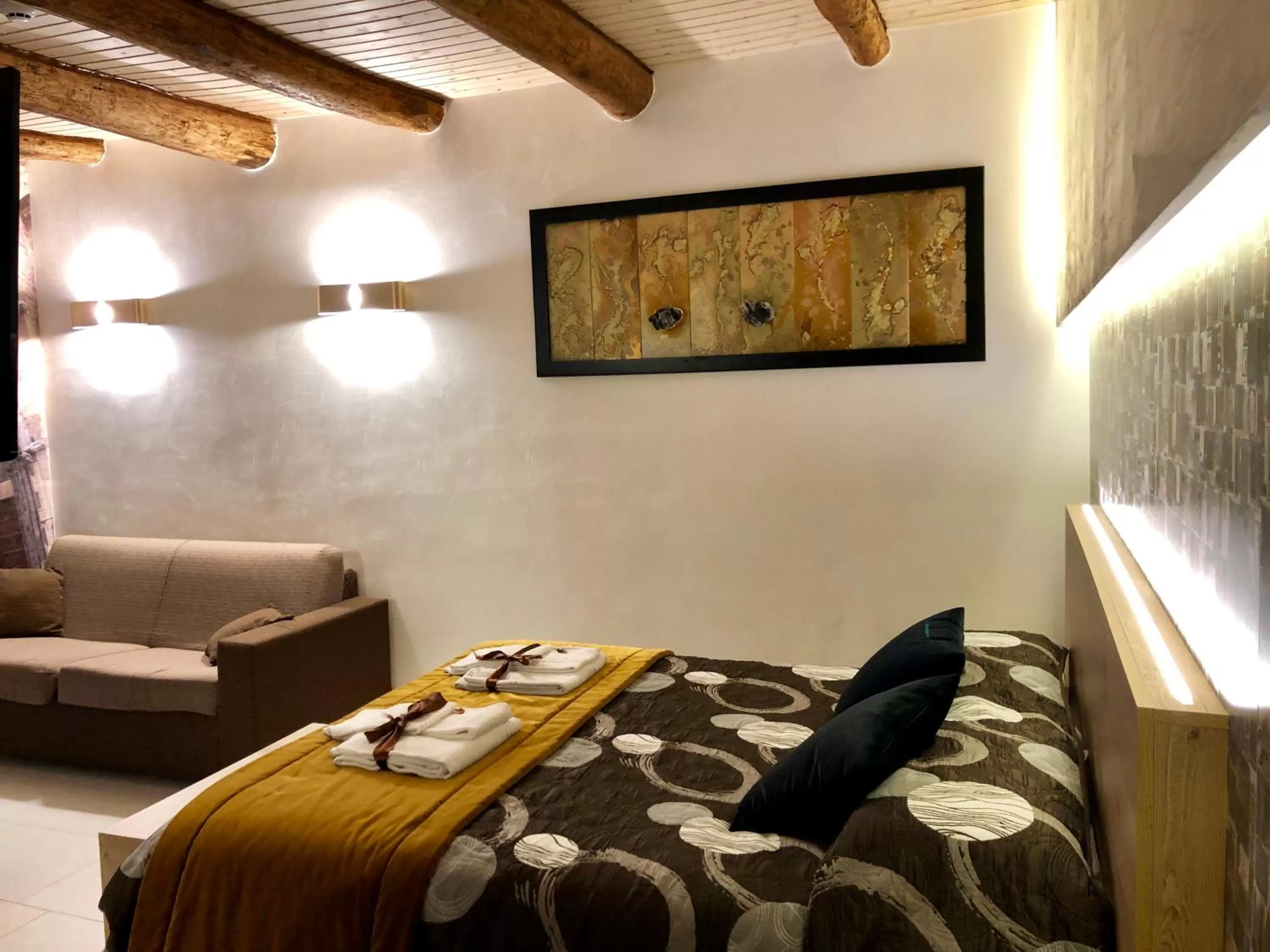 Bed in Relais Piazza Del Plebiscito B&B