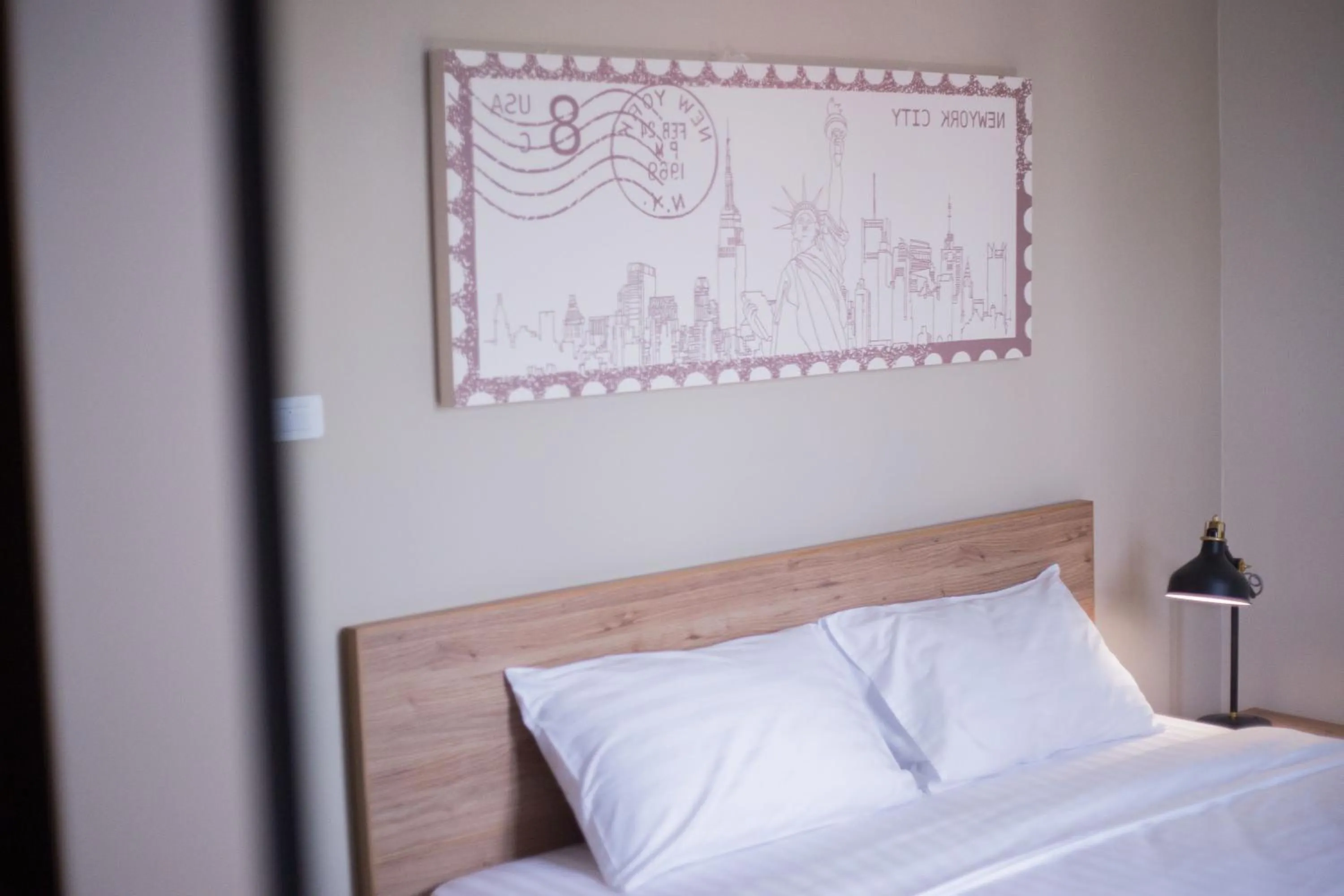 Decorative detail, Bed in The Journey Hotel Laksi