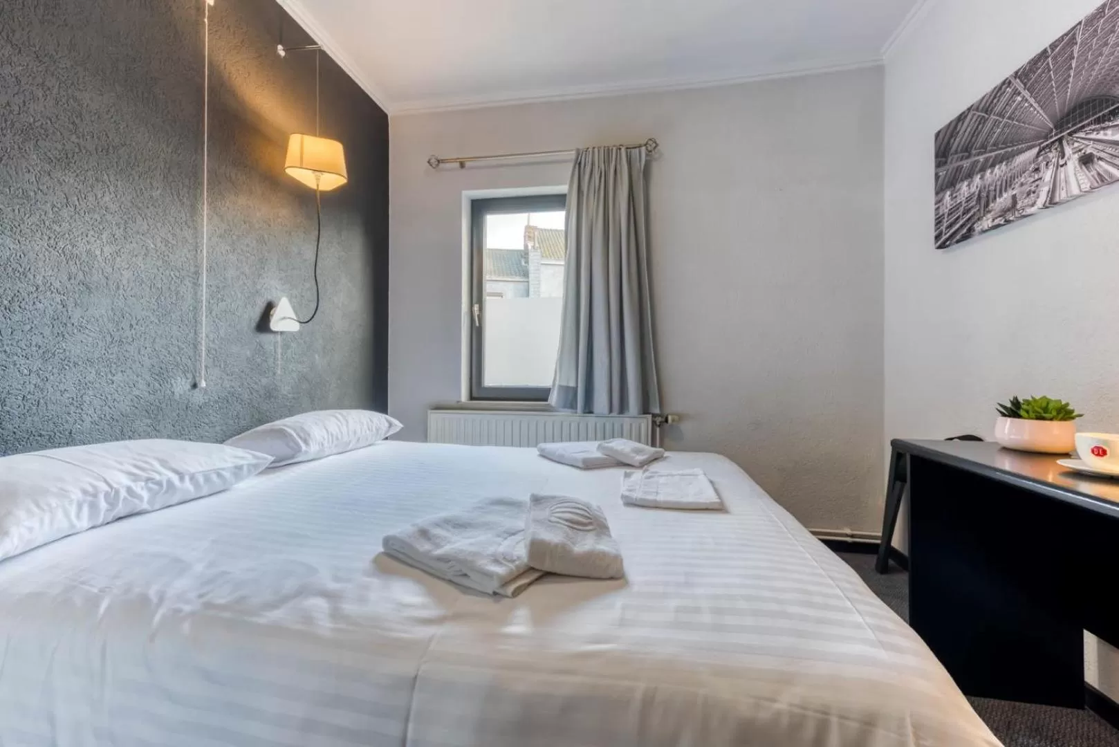 Photo of the whole room, Bed in Hôtel de la Gare