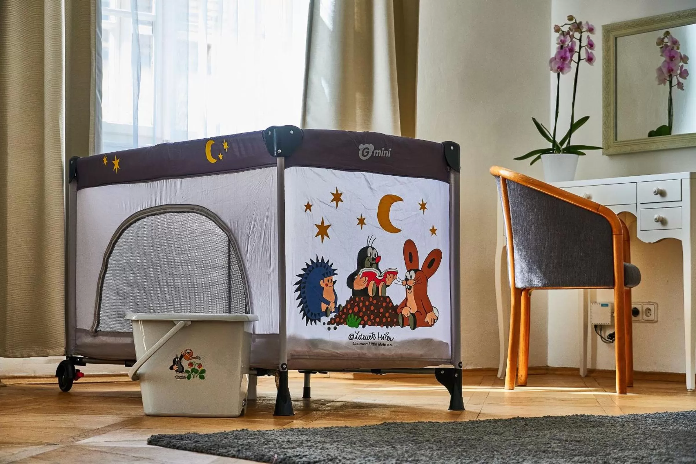 Bed in Three Golden Crowns Apartments