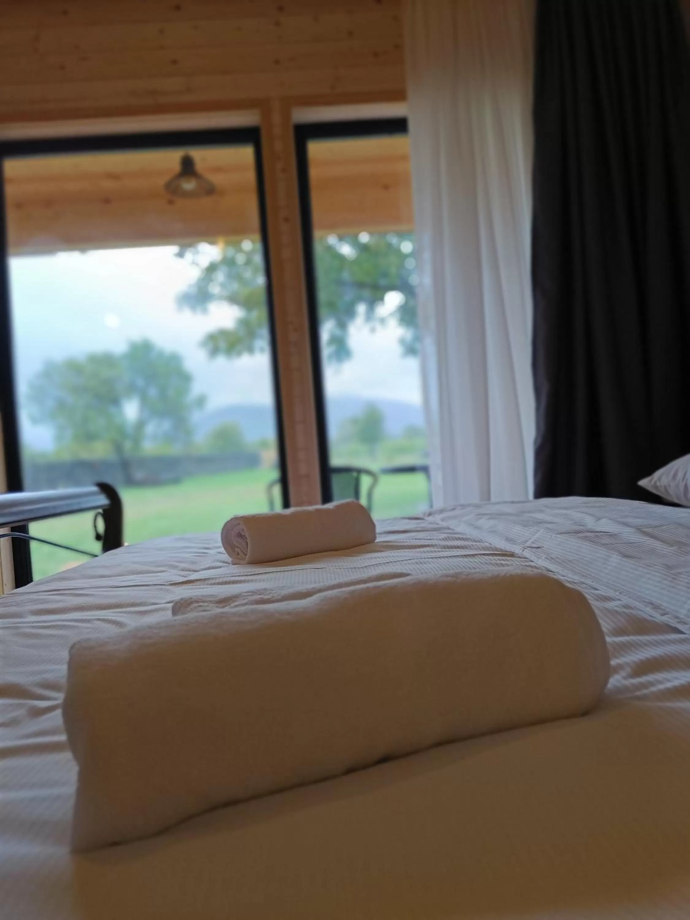 Bed in Chubini Winery & Cabins