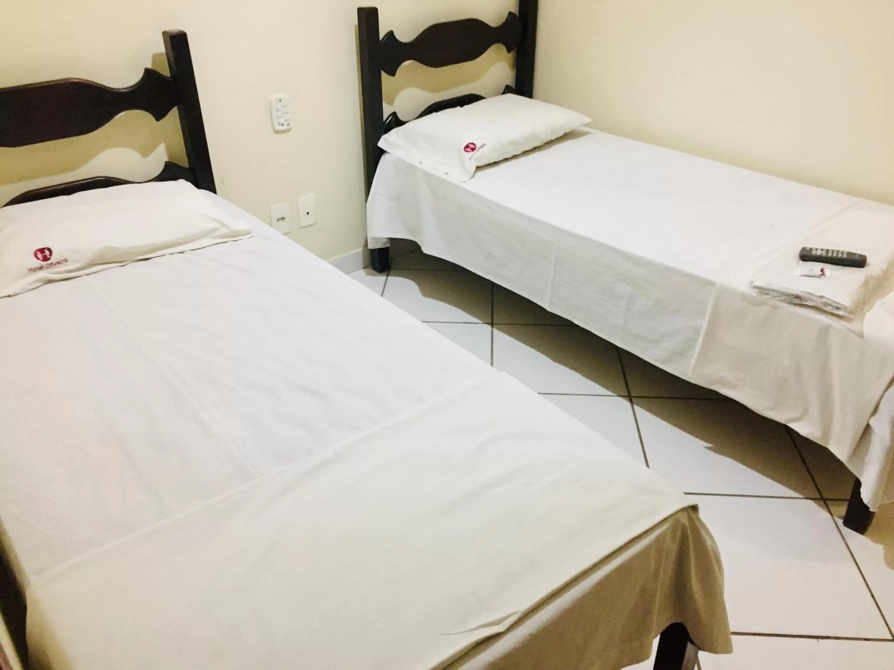 Bed in Hotel Oliveira