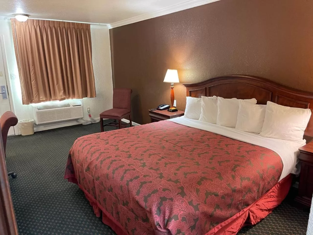 Bed in 1st Interstate Inn