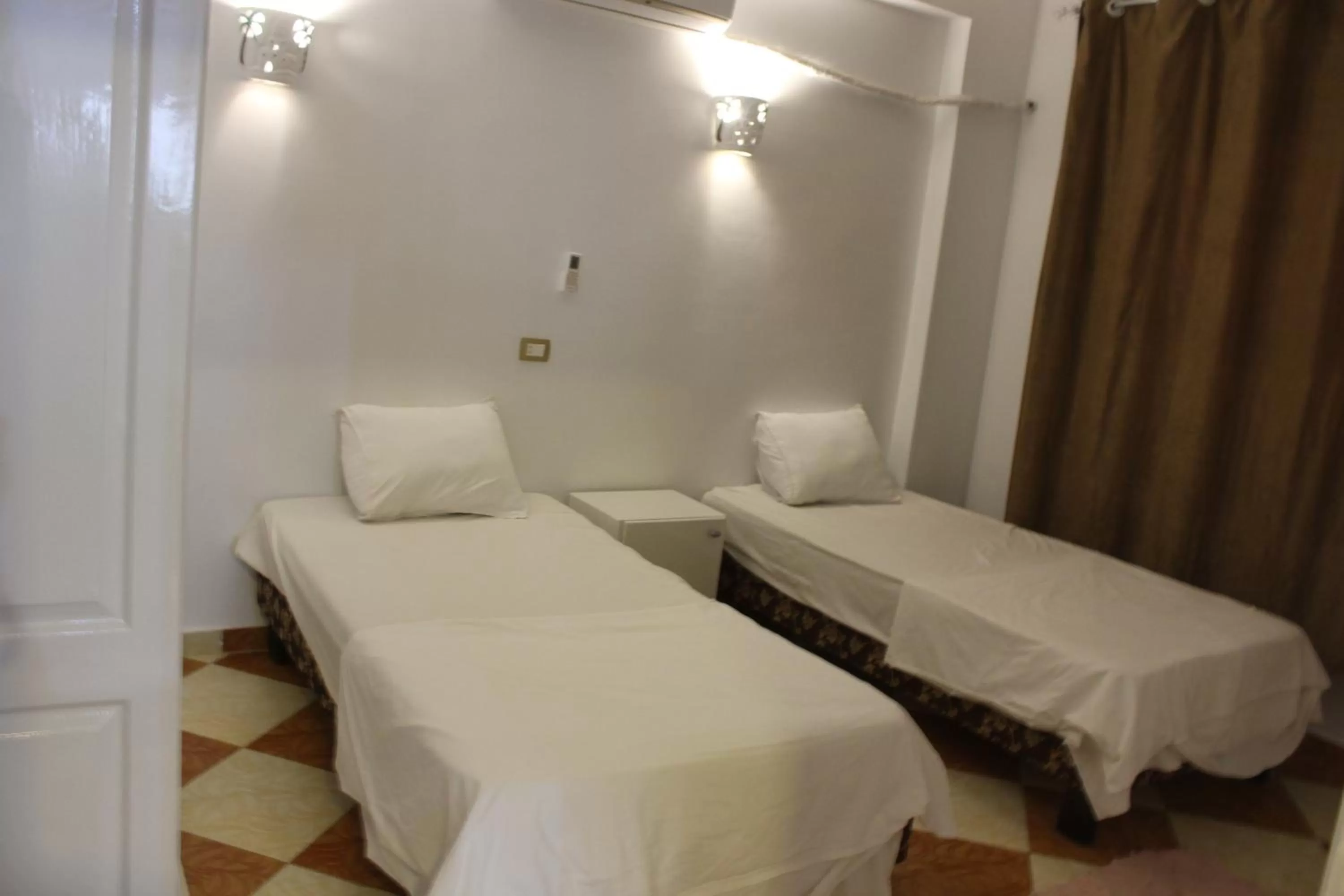 Bed in Mama Africa Apts & Studios