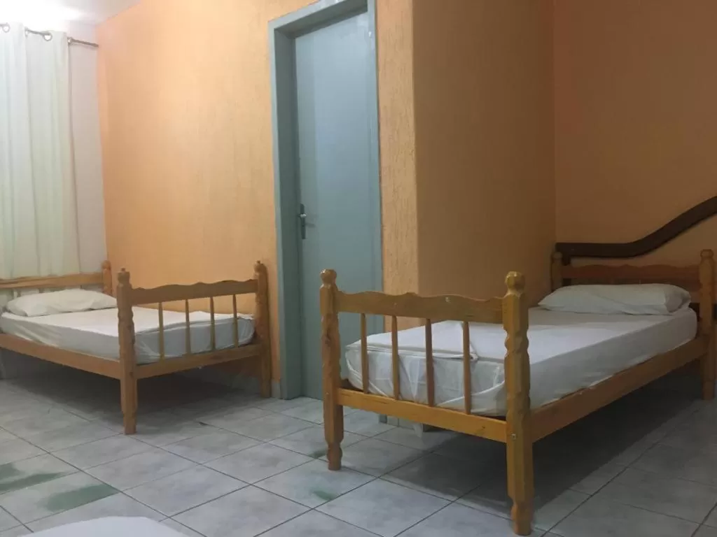 Bed in Hotel Solar Flores