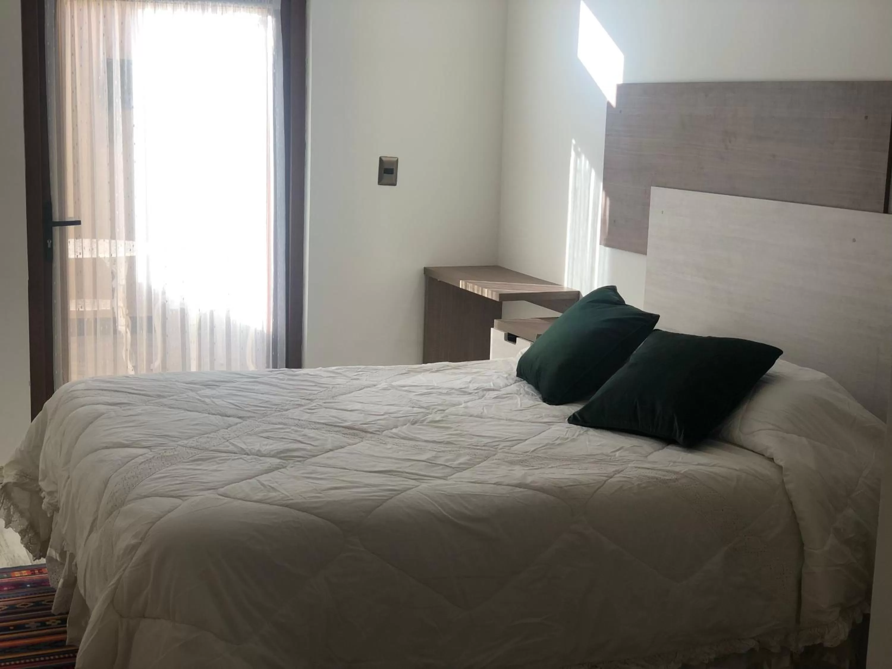 Bed in Hotel Boutique Suri