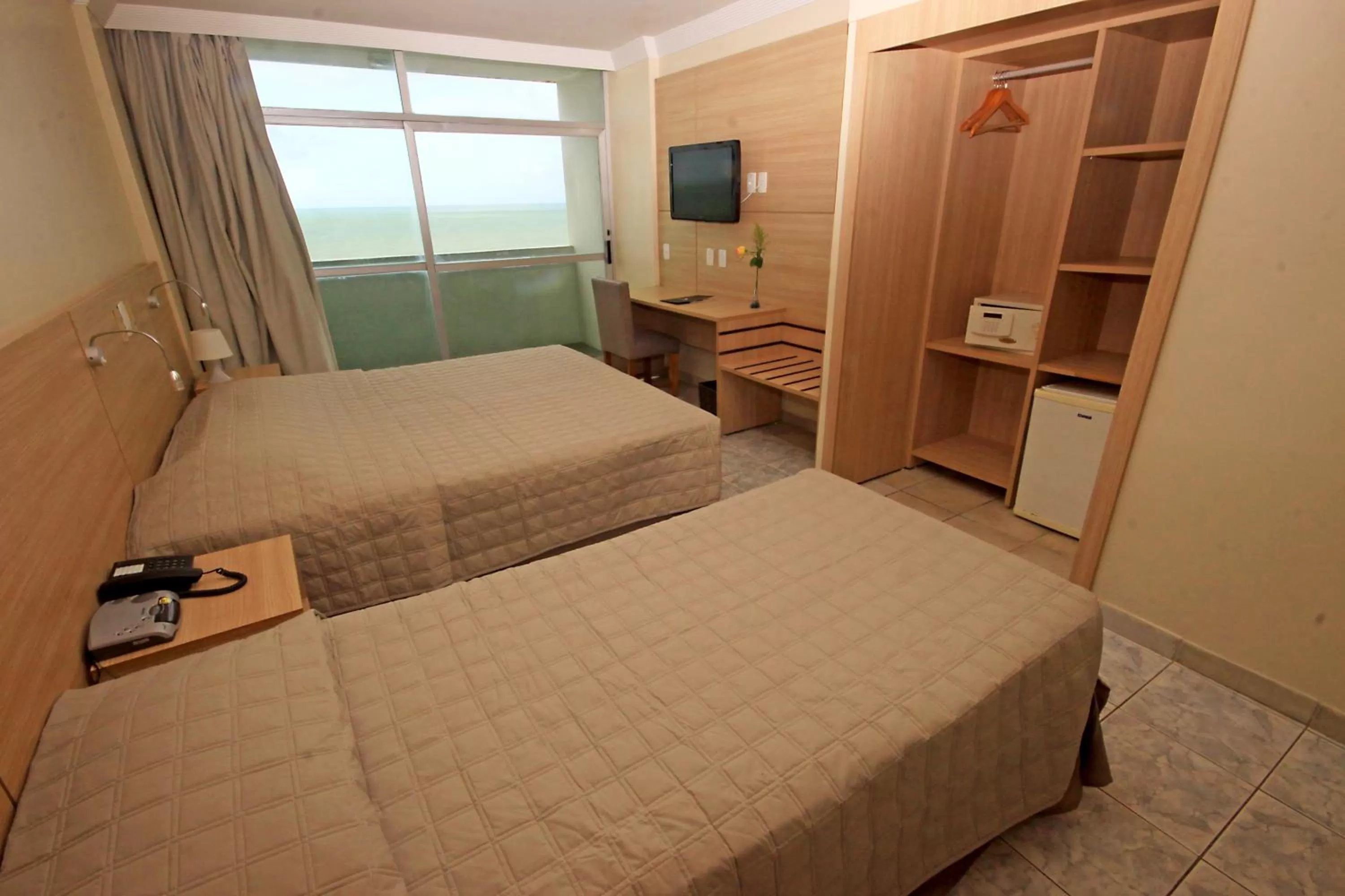 Bed in Hotel Jangadeiro