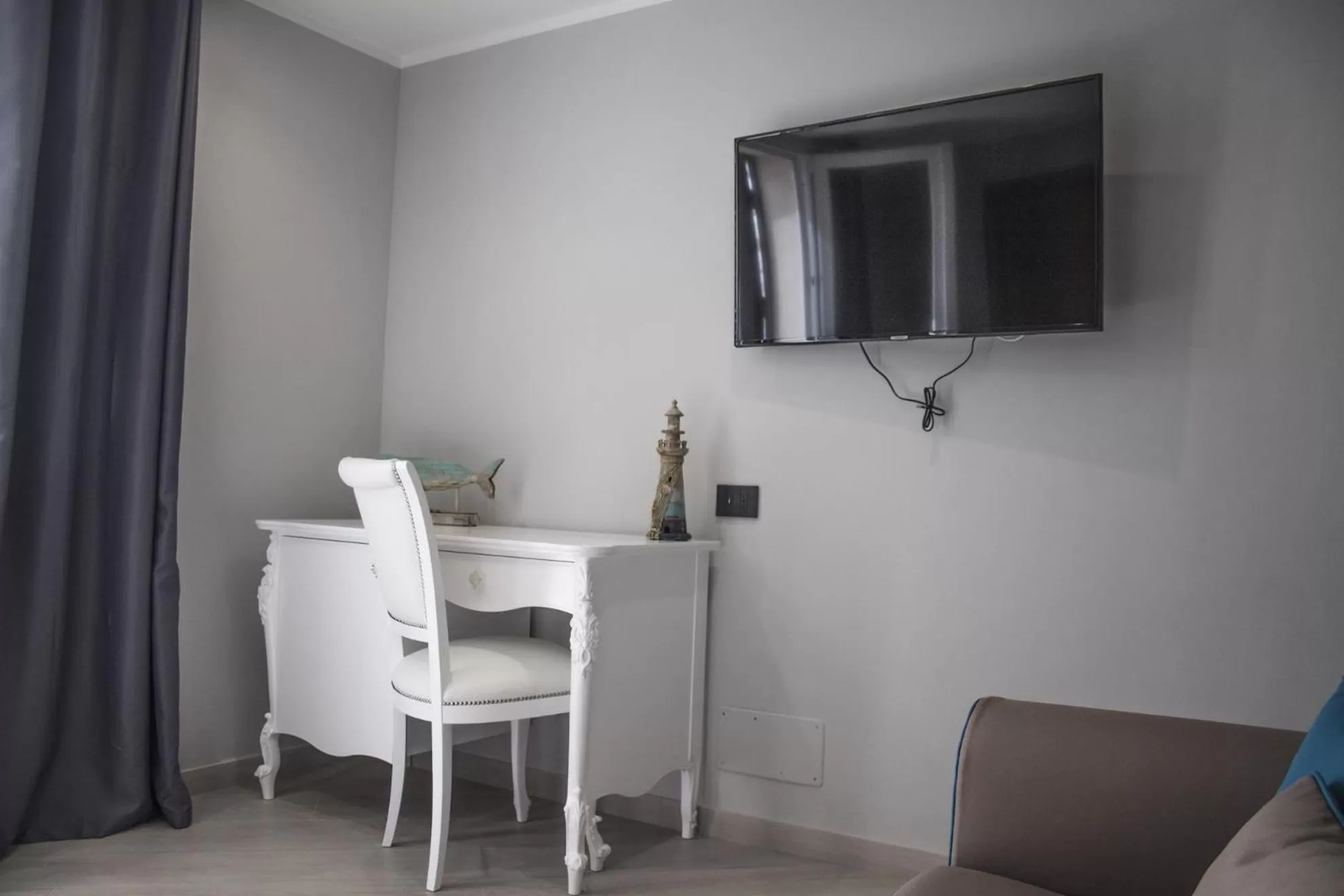 TV/Entertainment Center in Incanto Luxury Rooms