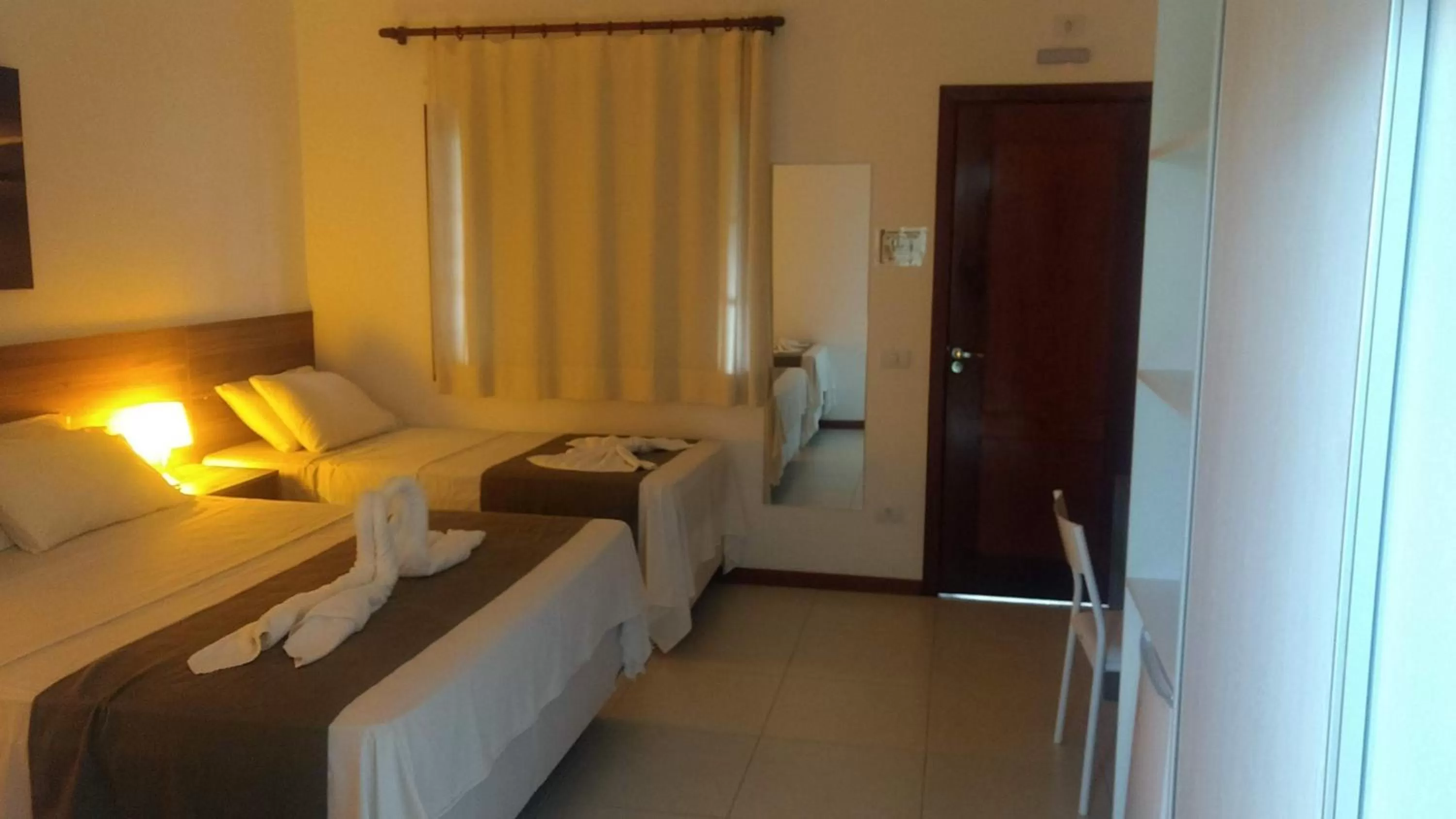 Bed in Hotel Pousada Salvador Paradise