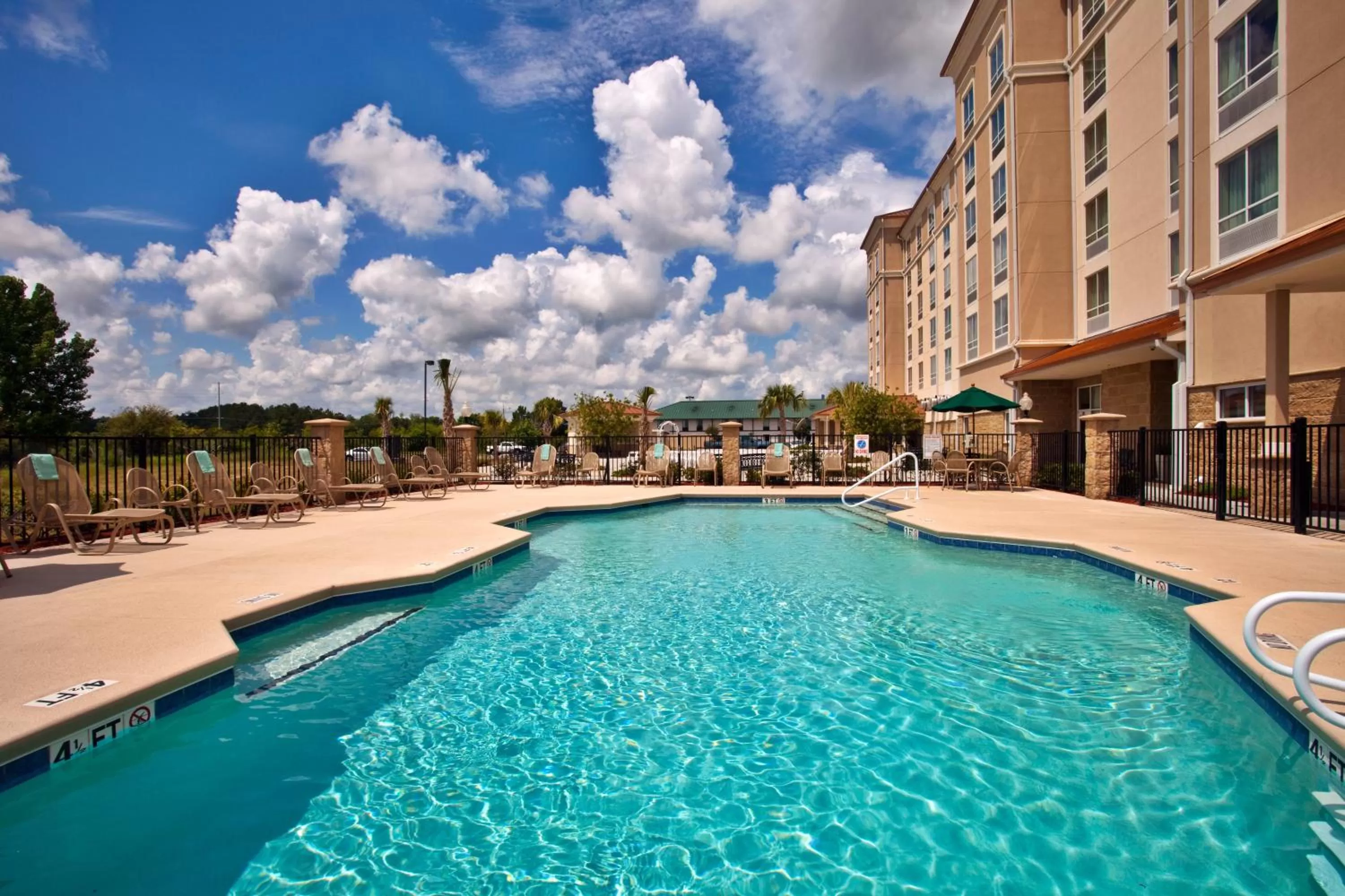 Swimming pool in Holiday Inn Valdosta Conference Center by IHG