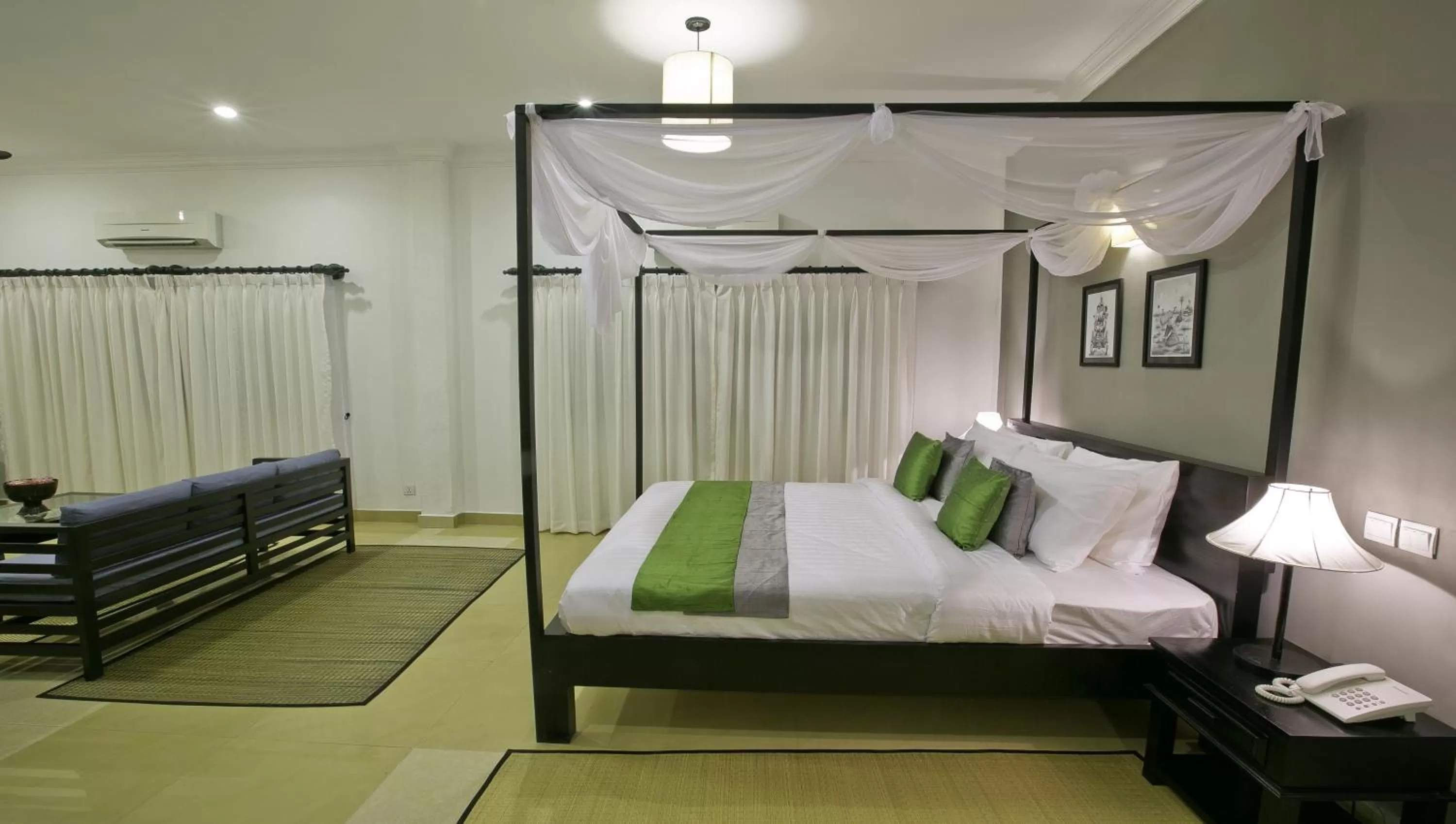 Photo of the whole room, Bed in The Cyclo d'Angkor Boutique Hotel