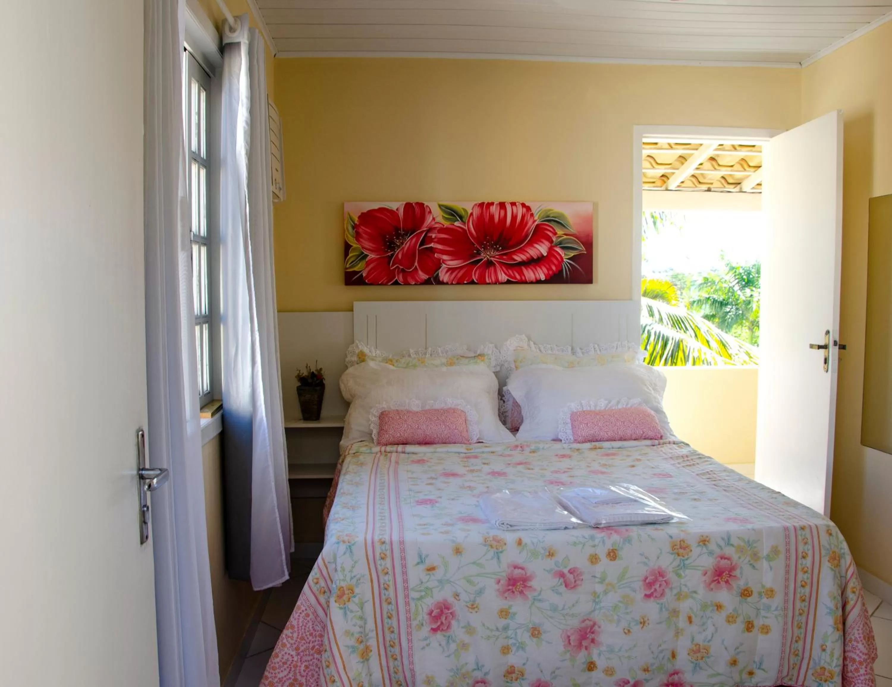 Bed in Pousada Luzes de Geribá