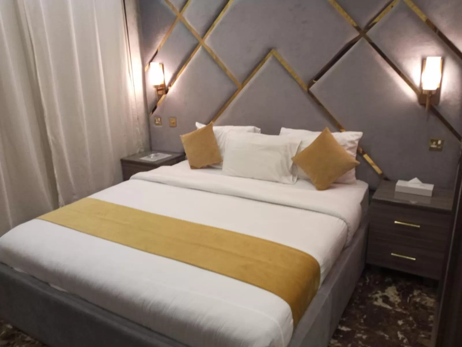 Bed in Rihanna Hotel Apartment