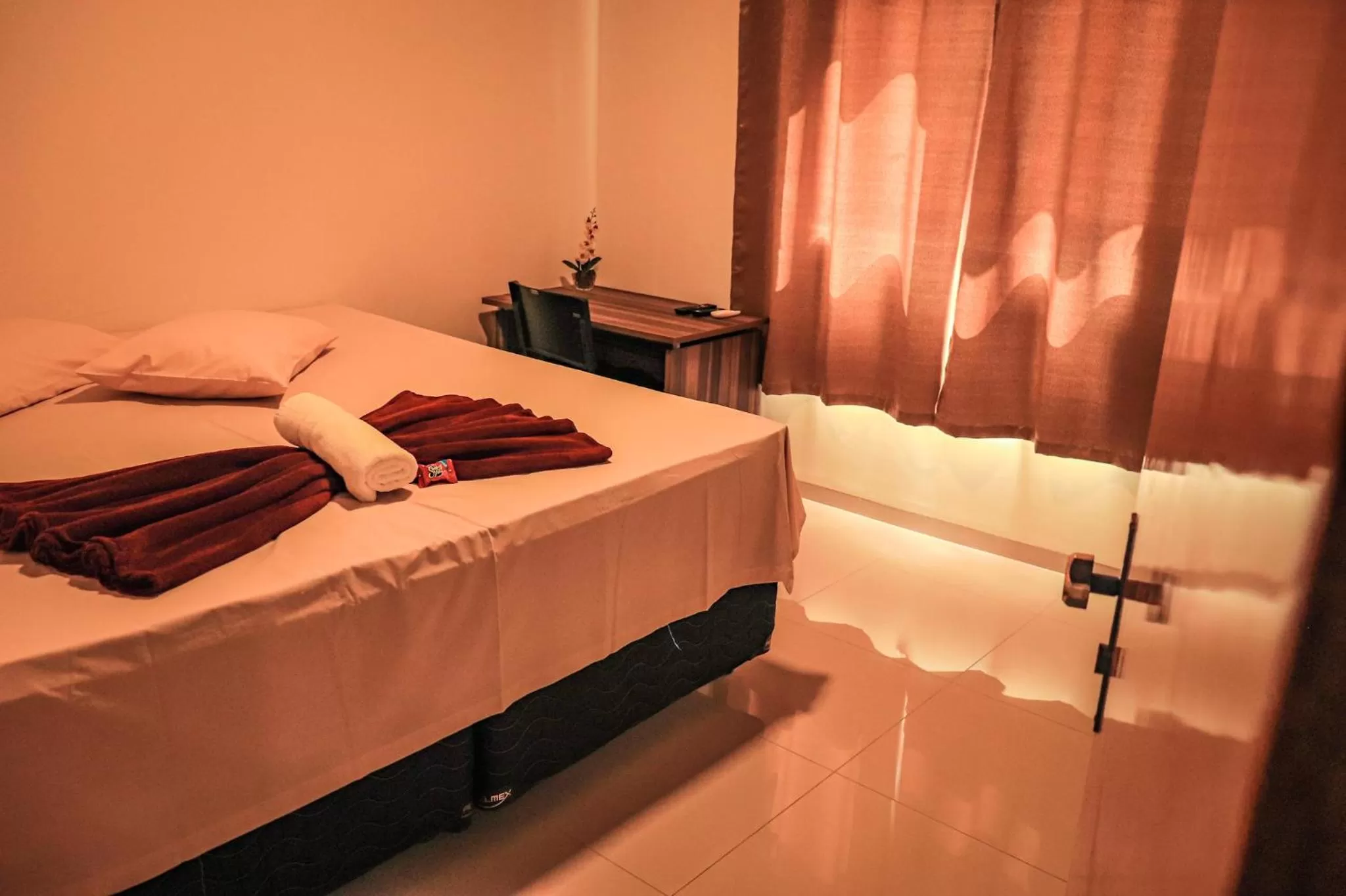 Bed in Pousada Casa Grande