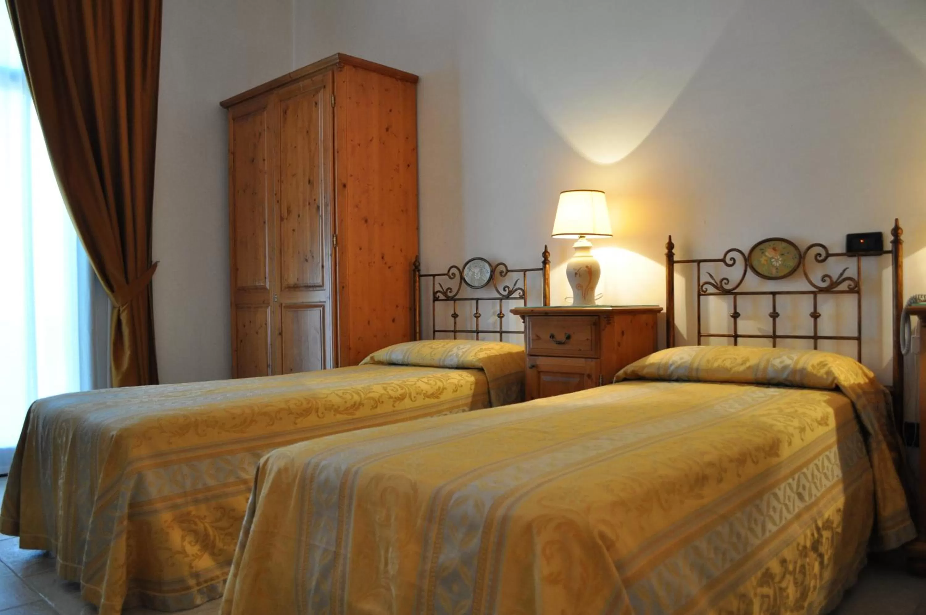 Bed in Grikò Country Hotel