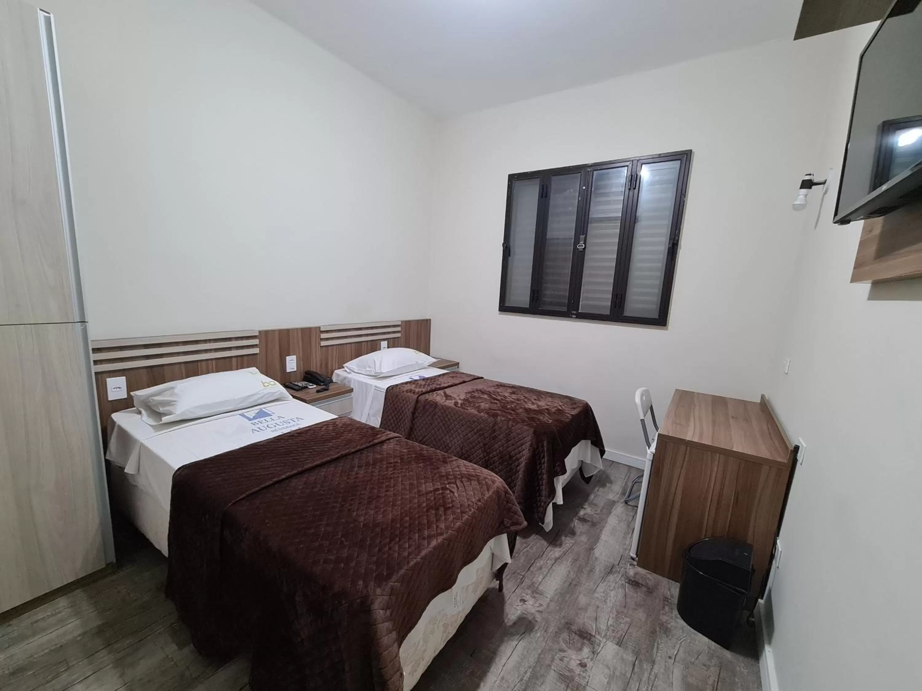 Bed in Bella Augusta Hotel