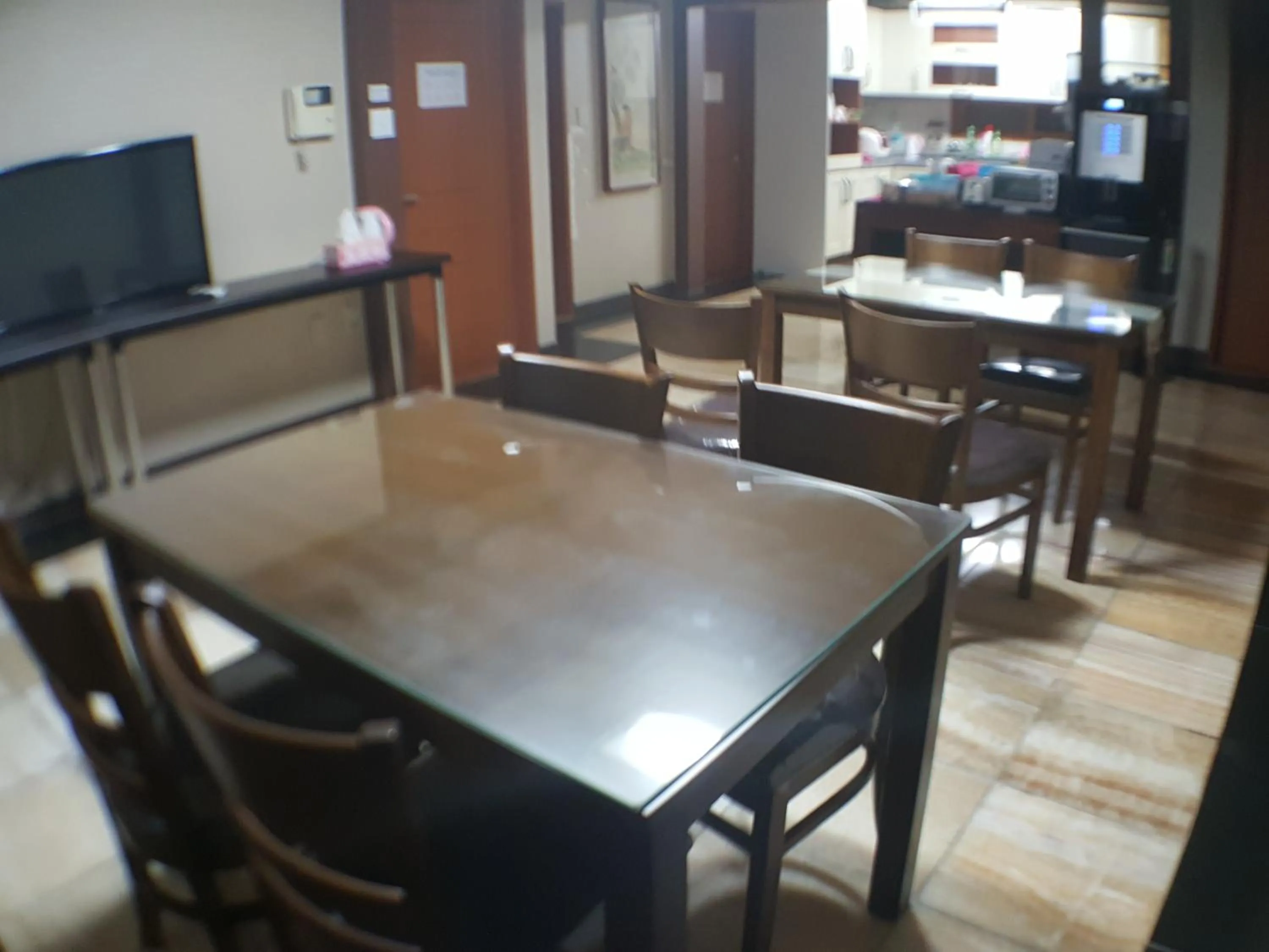 Communal lounge/ TV room in Plus Motel