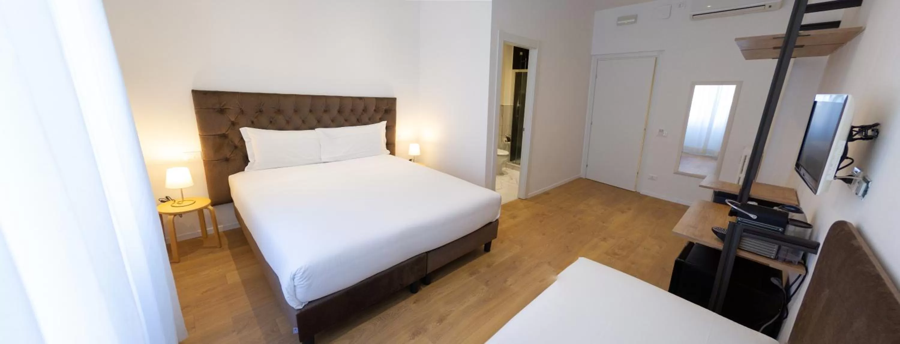 Bed in Michelangelo Vatican Rooms