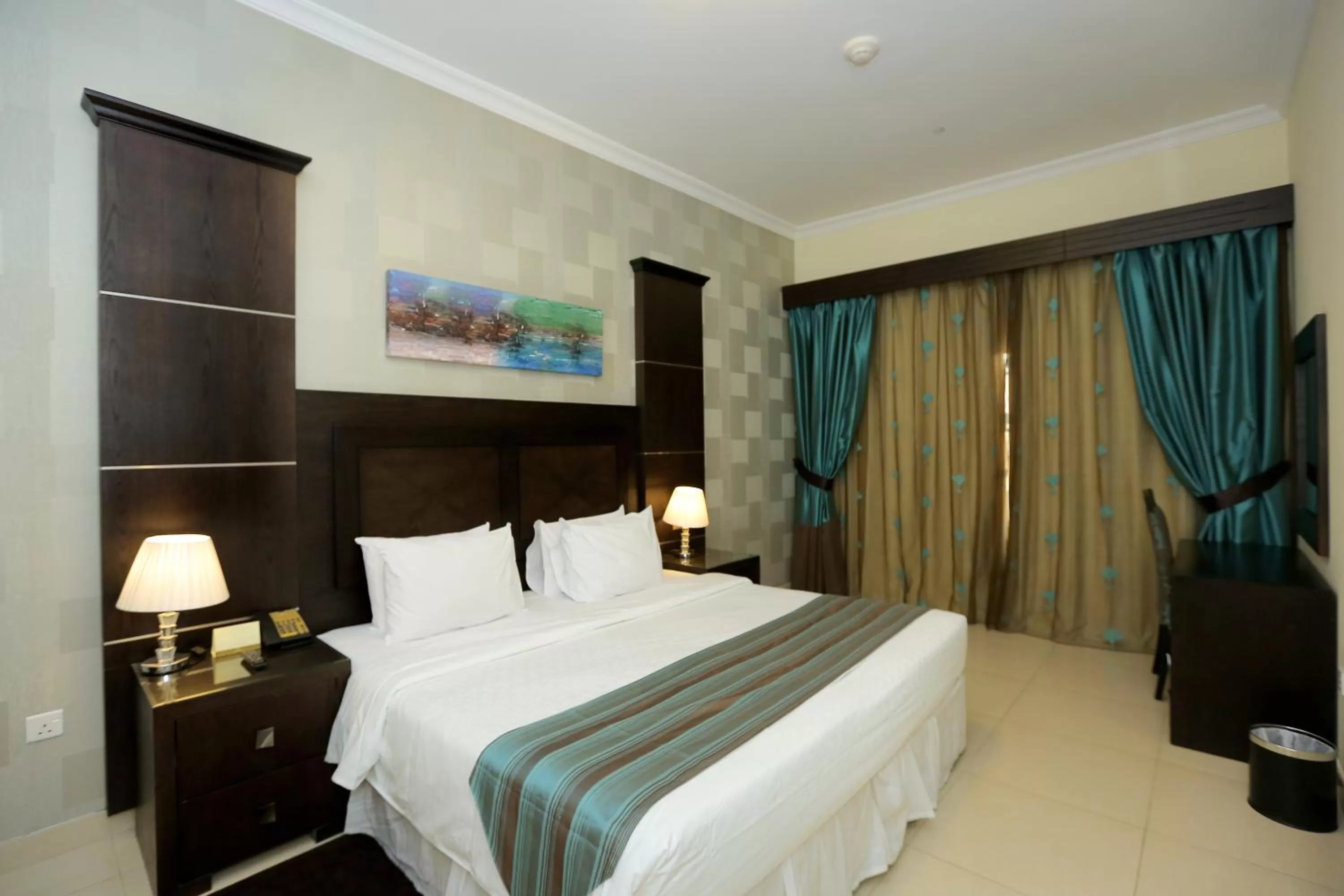 Bed in Ivory Grand Hotel Apartments