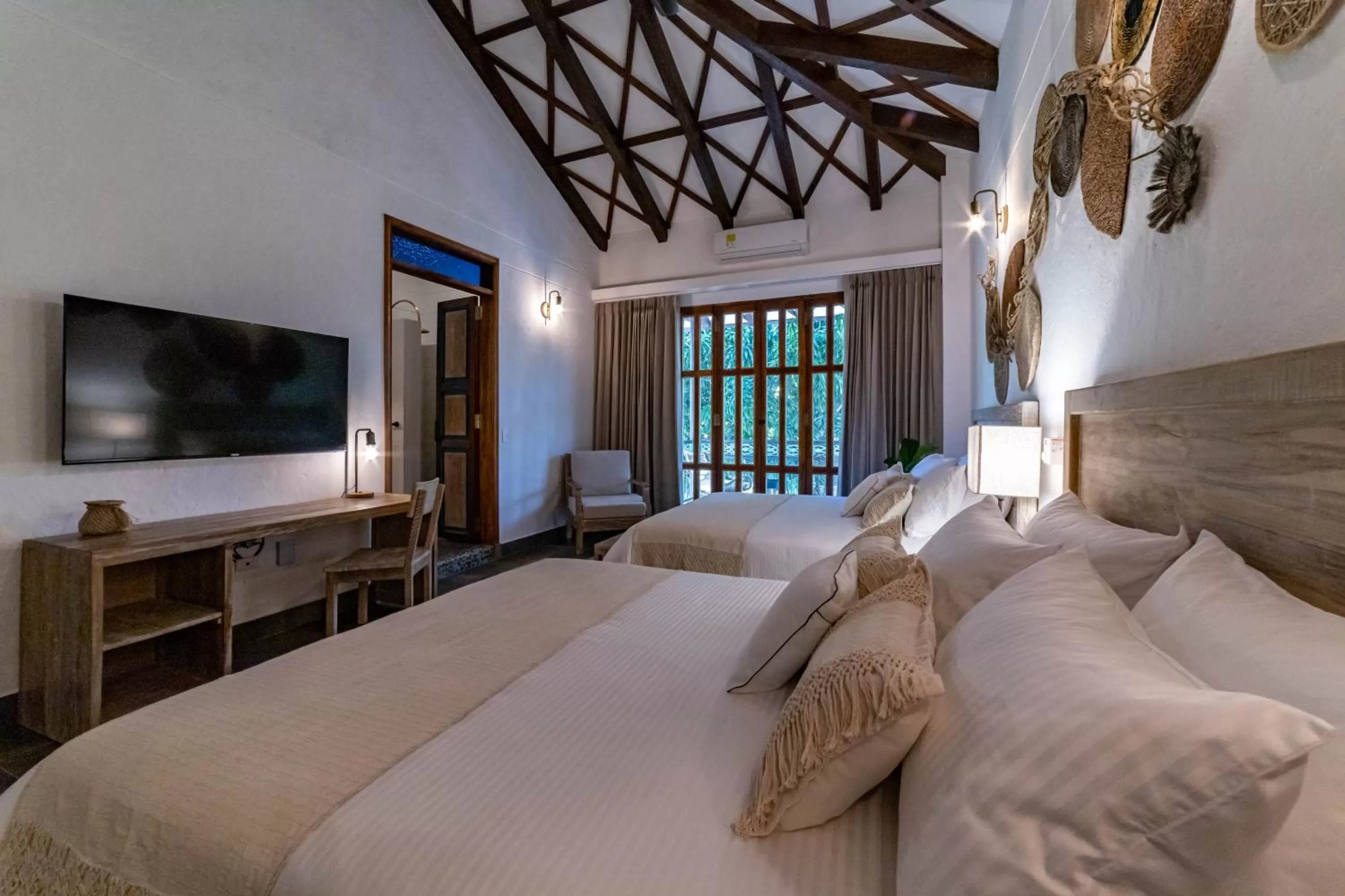 Bed in Casa Jacaranda Hotel Boutique