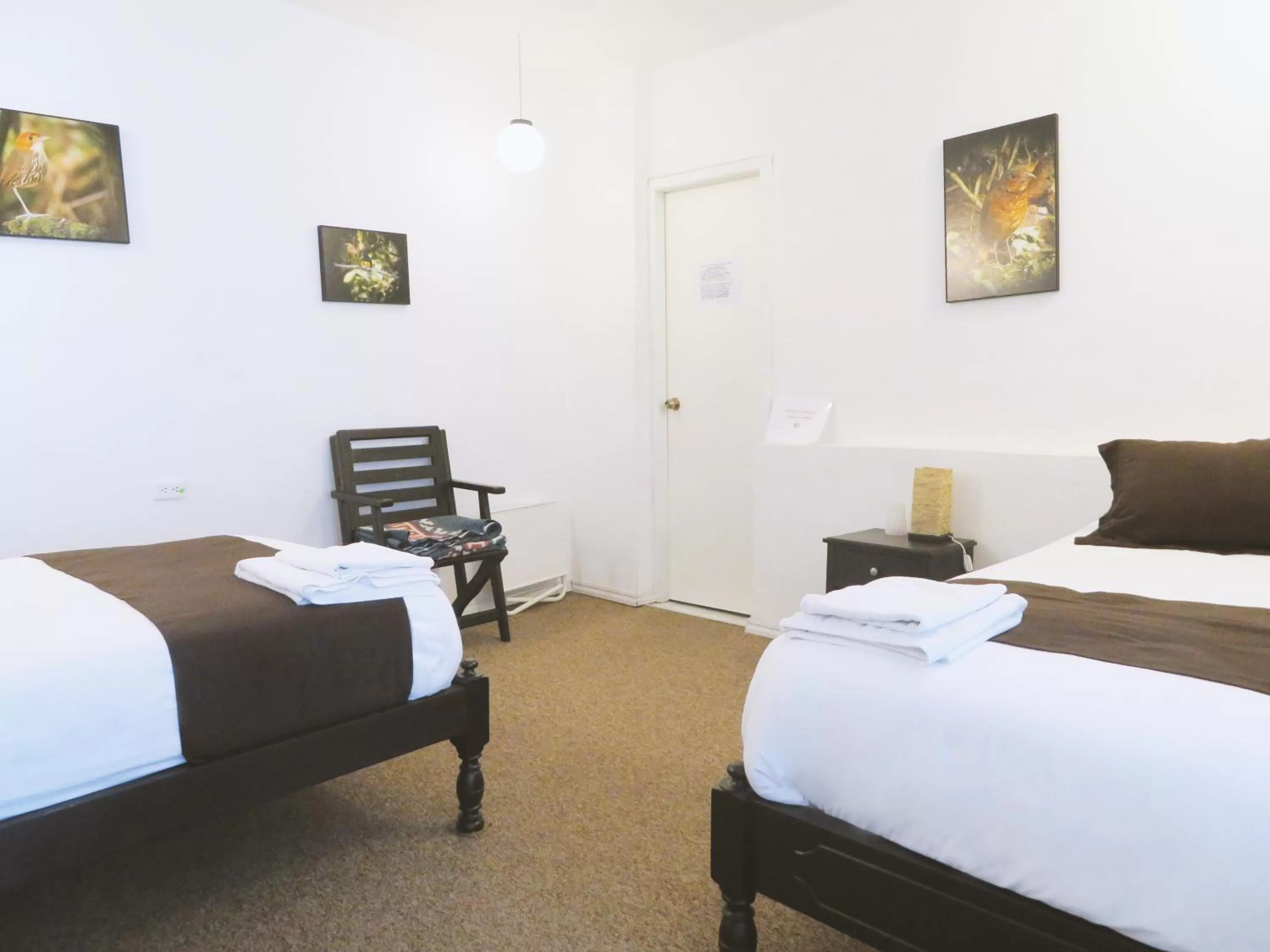 Bed in Bird Garden Guest House