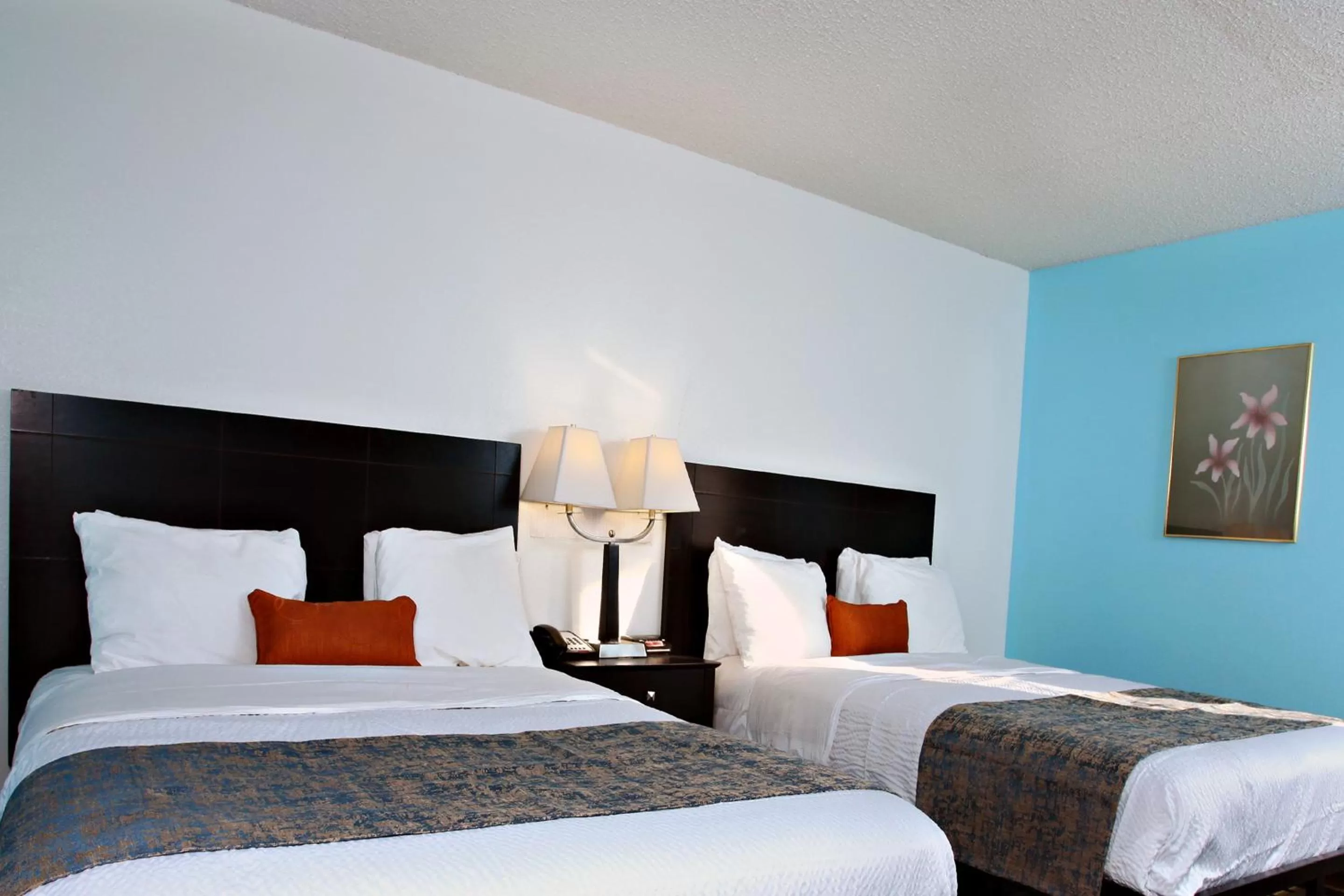 Bed in Coratel Inn & Suites by Jasper Newton