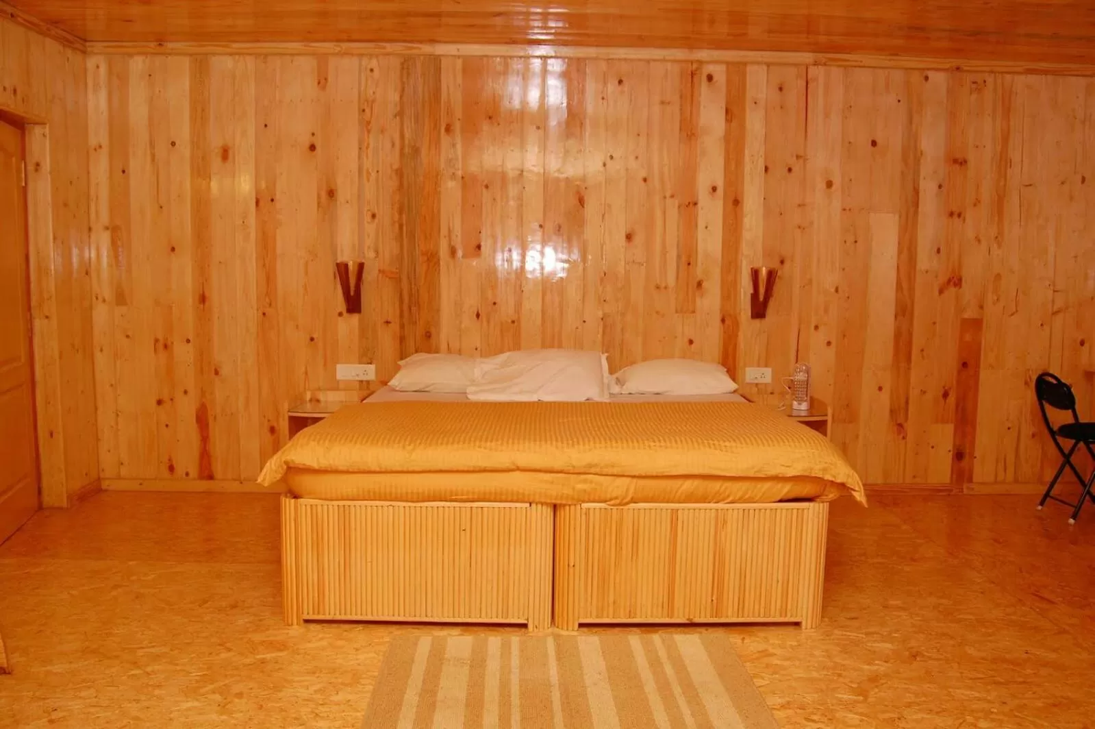 Bed in Surya Holidays Kodaikanal