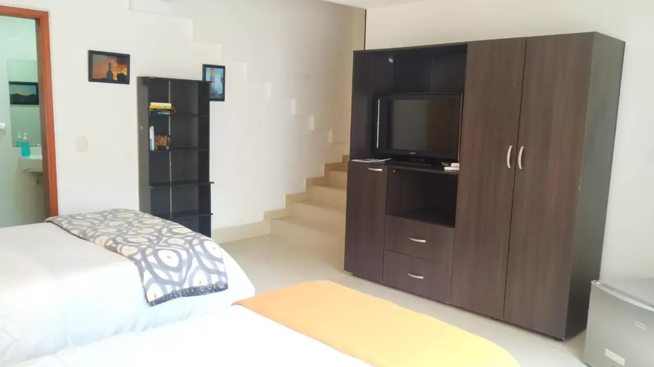 Photo of the whole room, TV/Entertainment Center in Casa Prada Bed & Breakfast