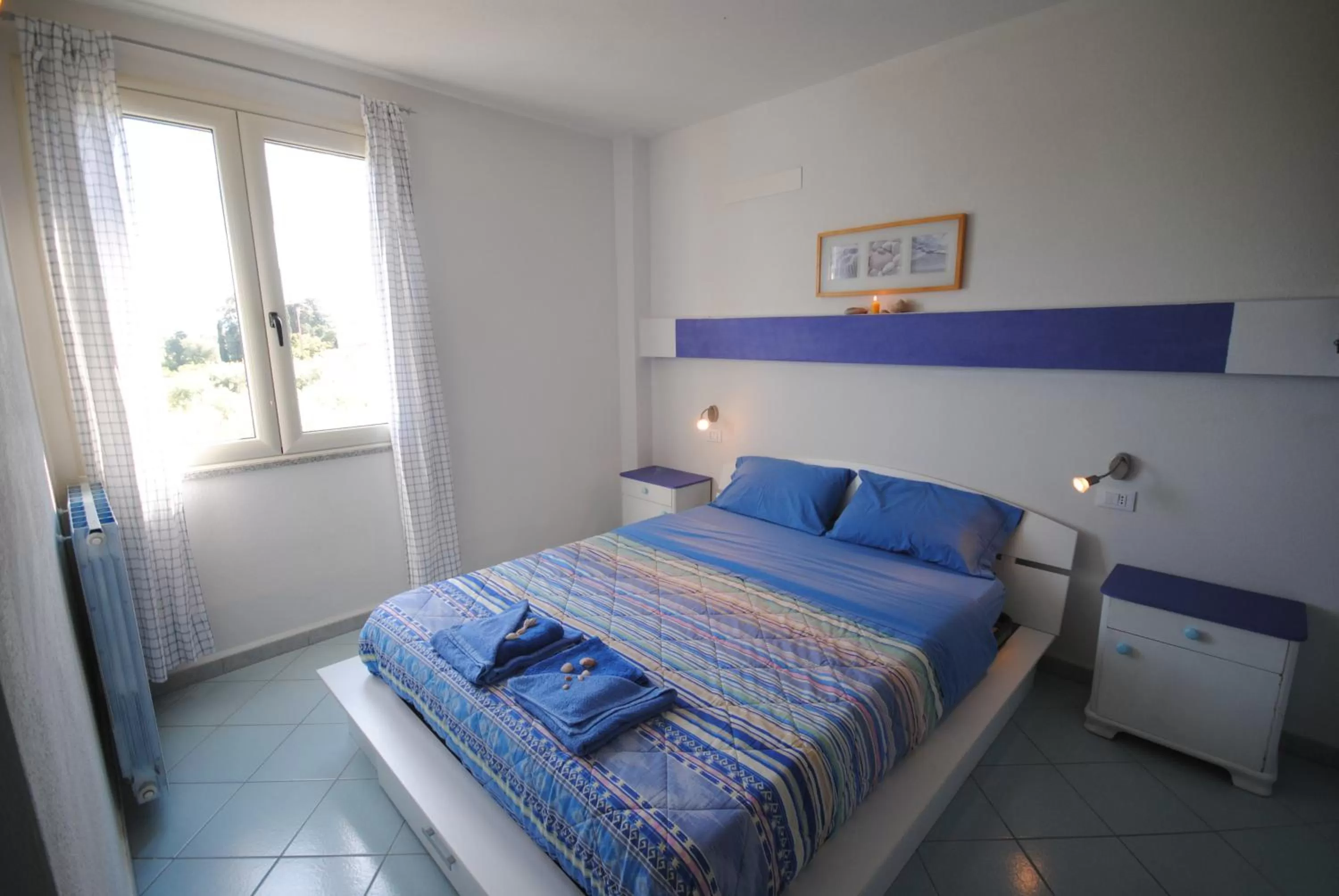 Bed in Holiday Residence Rifugio