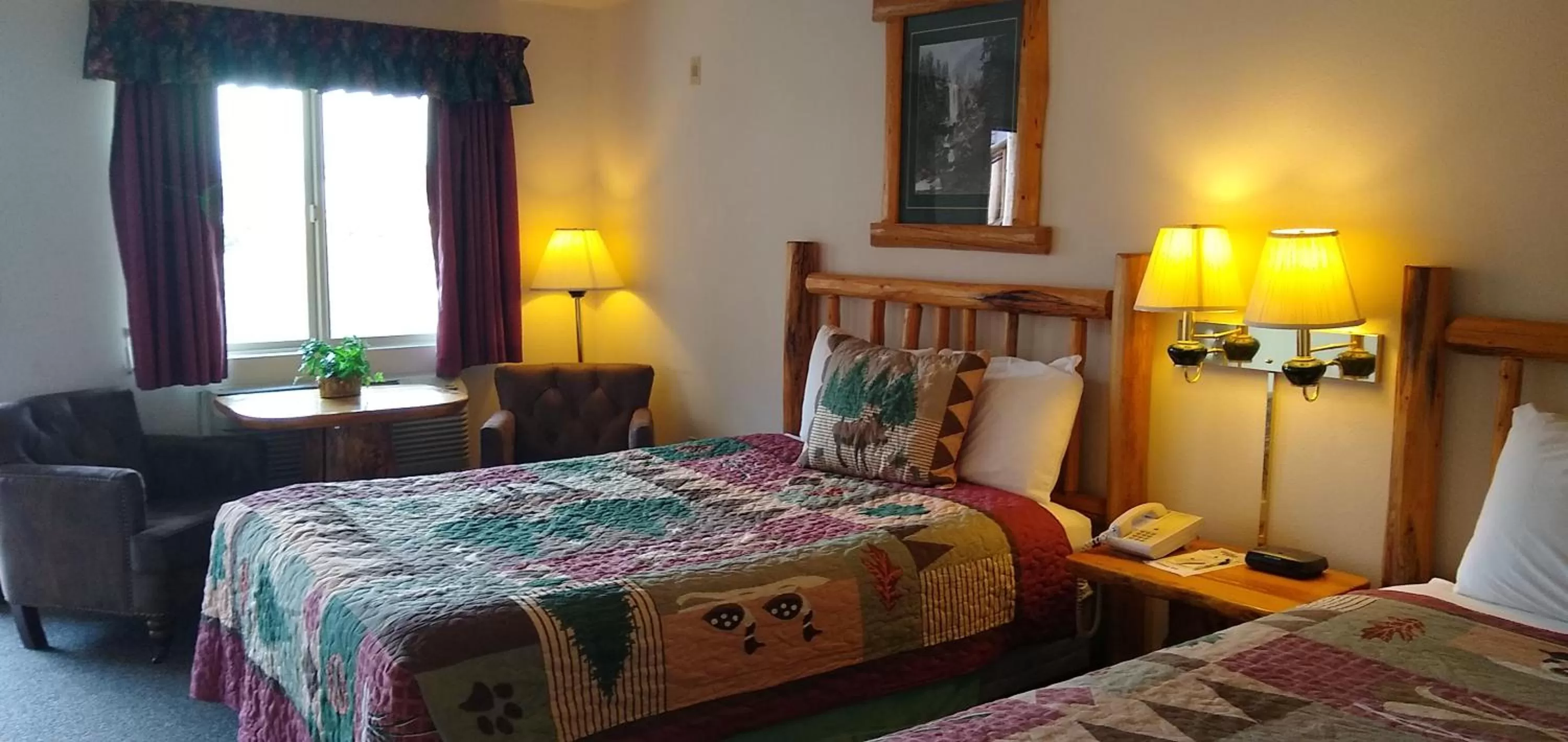 Bed in Ponderosa Motel