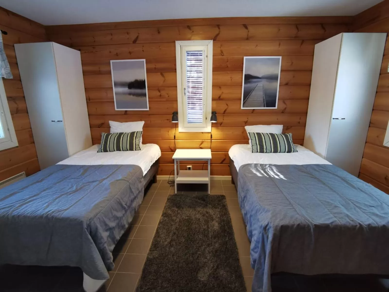 Bed in Rauhalahti Holiday Homes