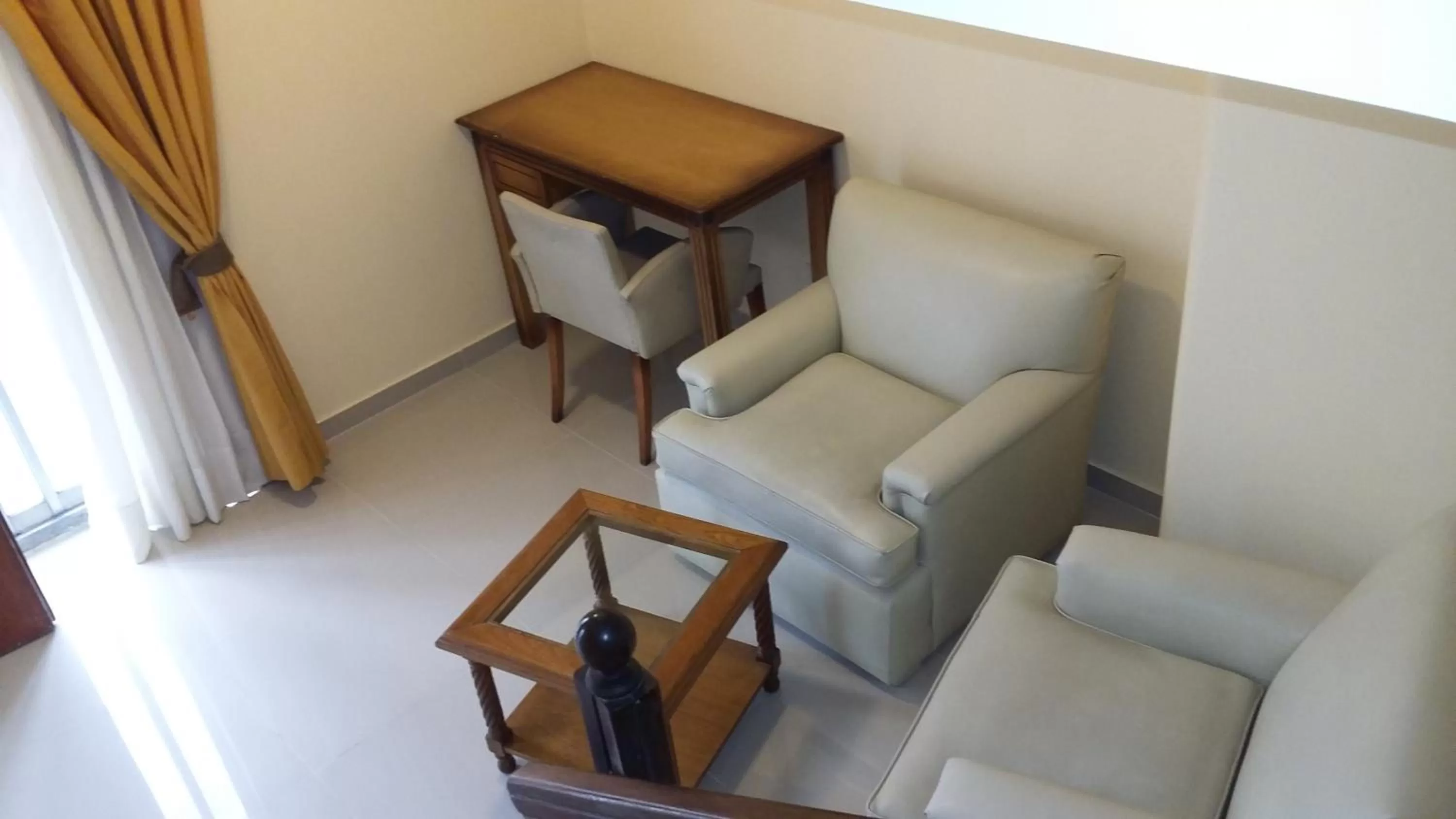 Seating area in Tritone Hotel