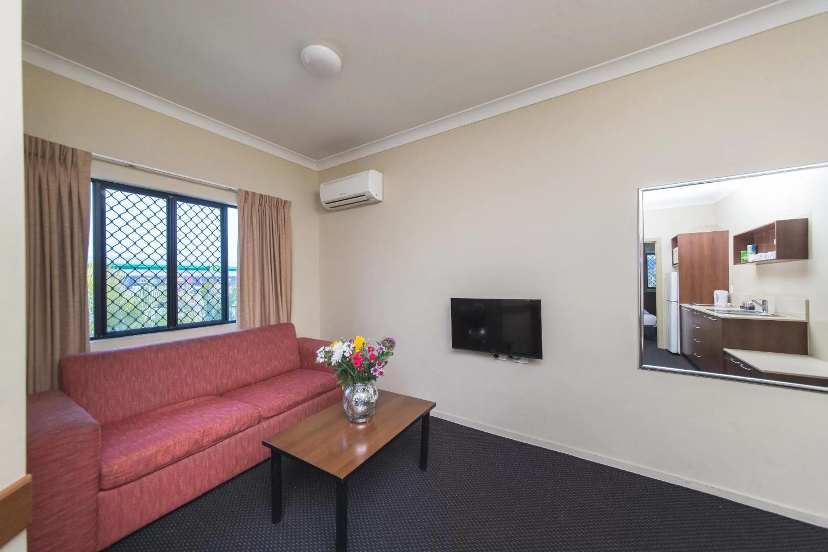 Living room in Rocky Resort Motor Inn