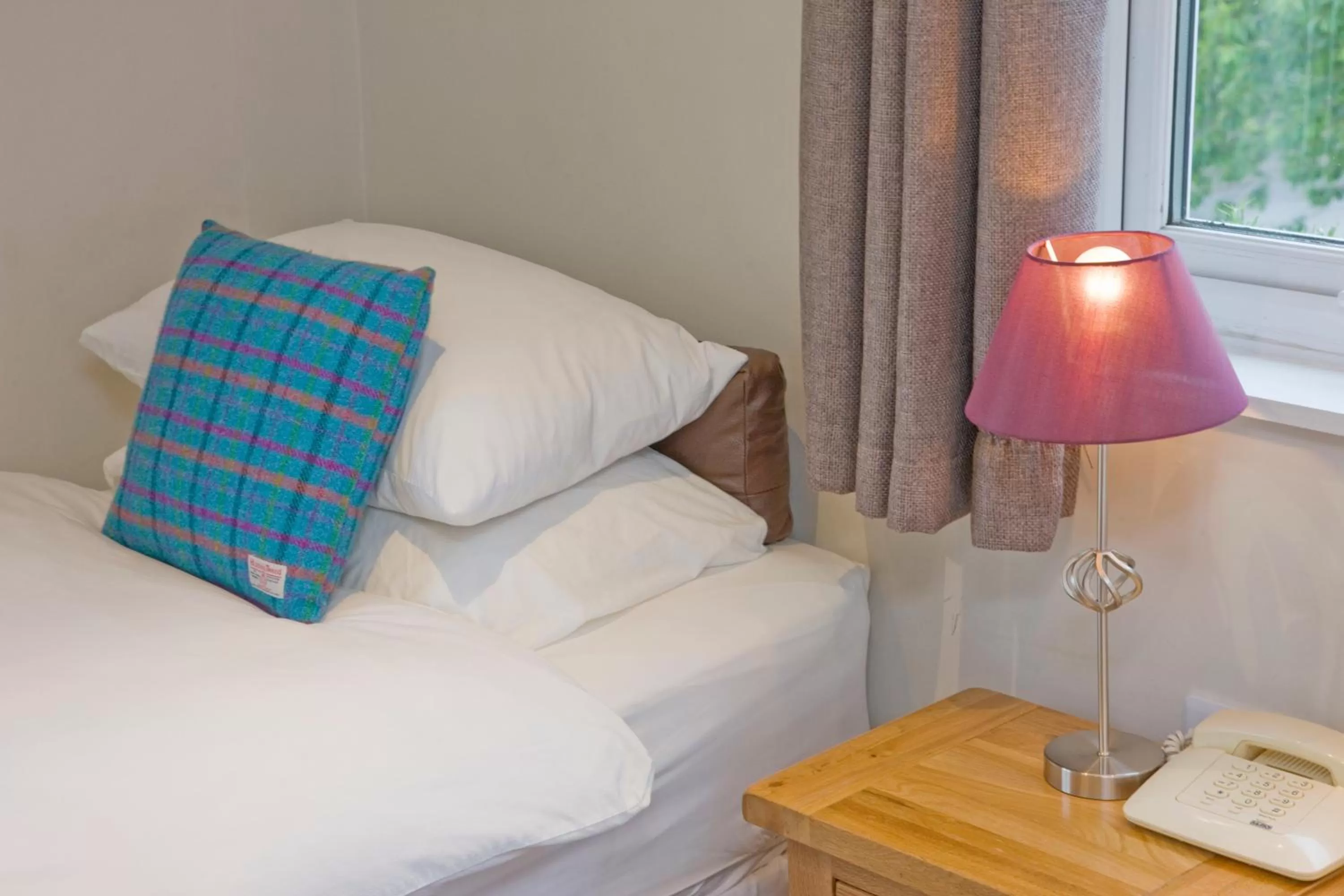 Bed in Falls of Lora Hotel