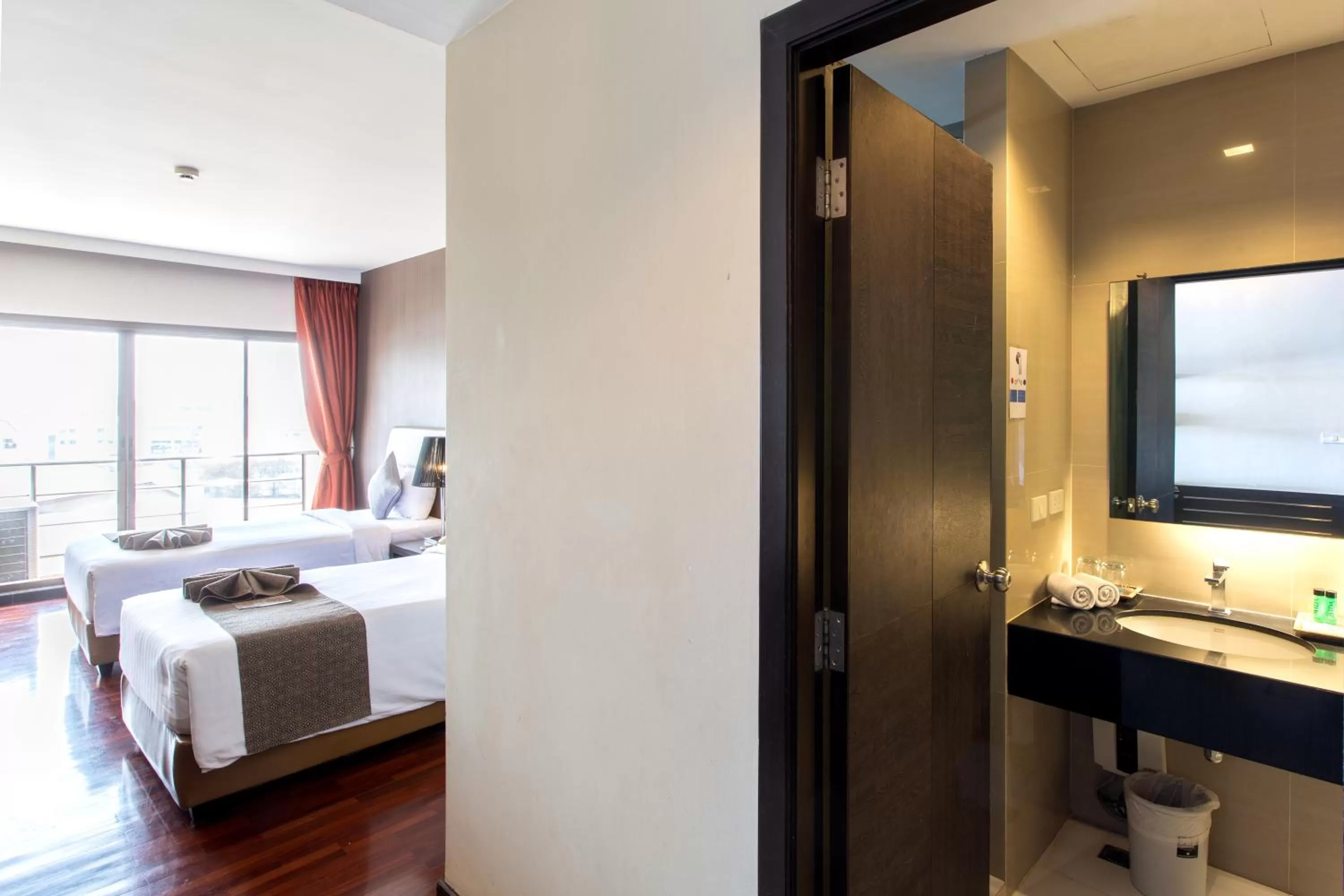 Bathroom, Bed in Mida Hotel Don Mueang Airport