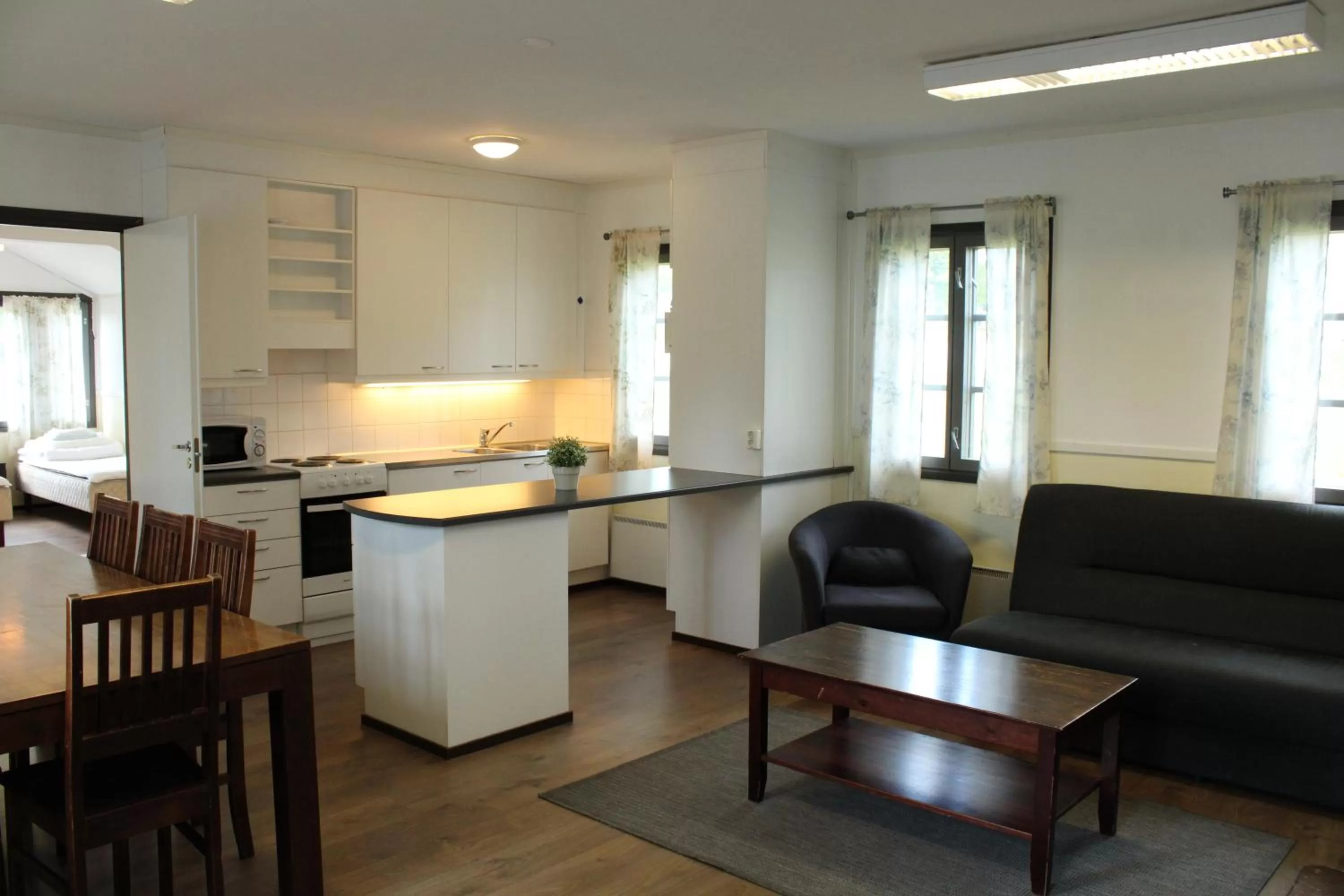 Living room, Kitchen/Kitchenette in Visulahti Cottages