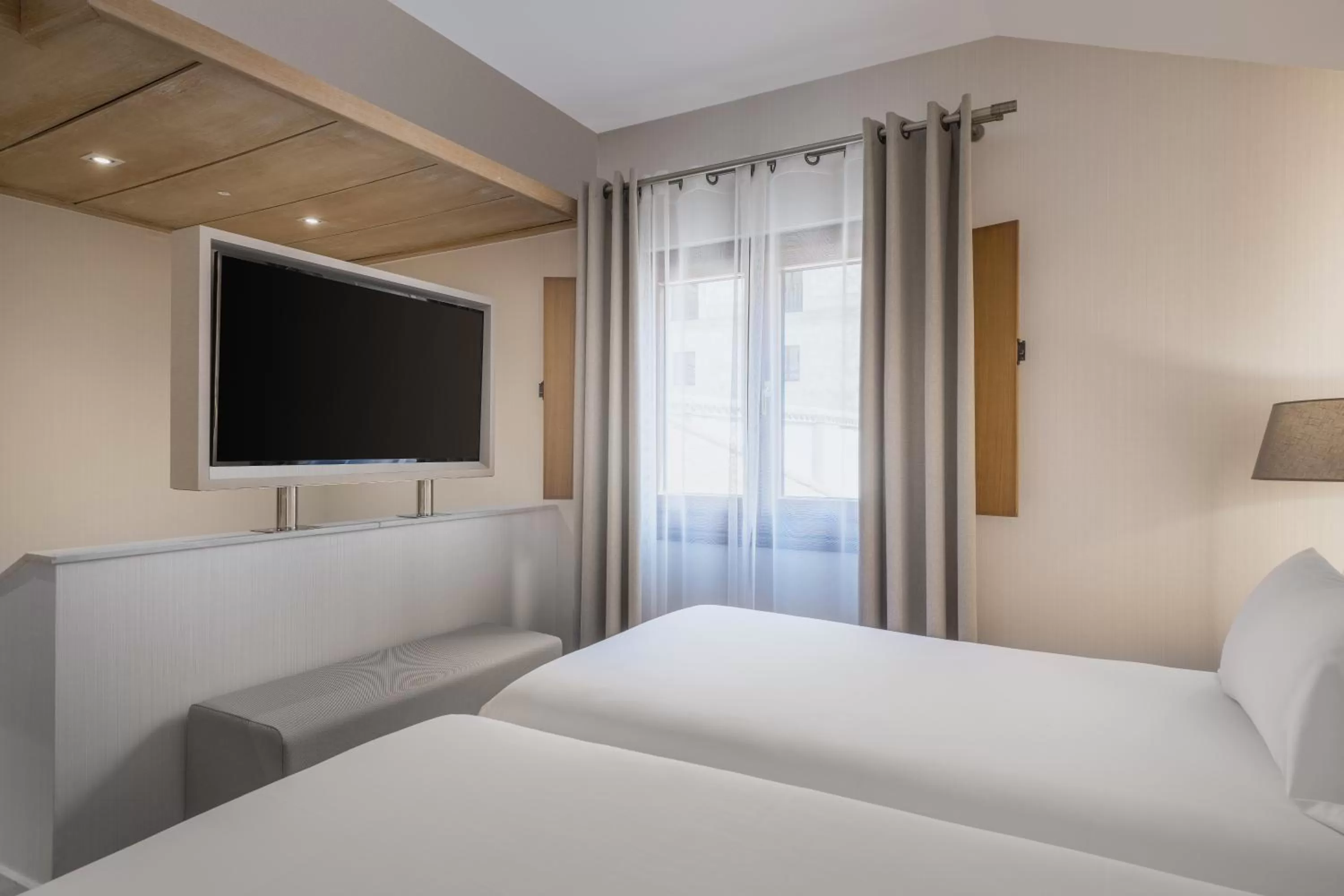 Bed in NH Collection Salamanca Palacio de Castellanos